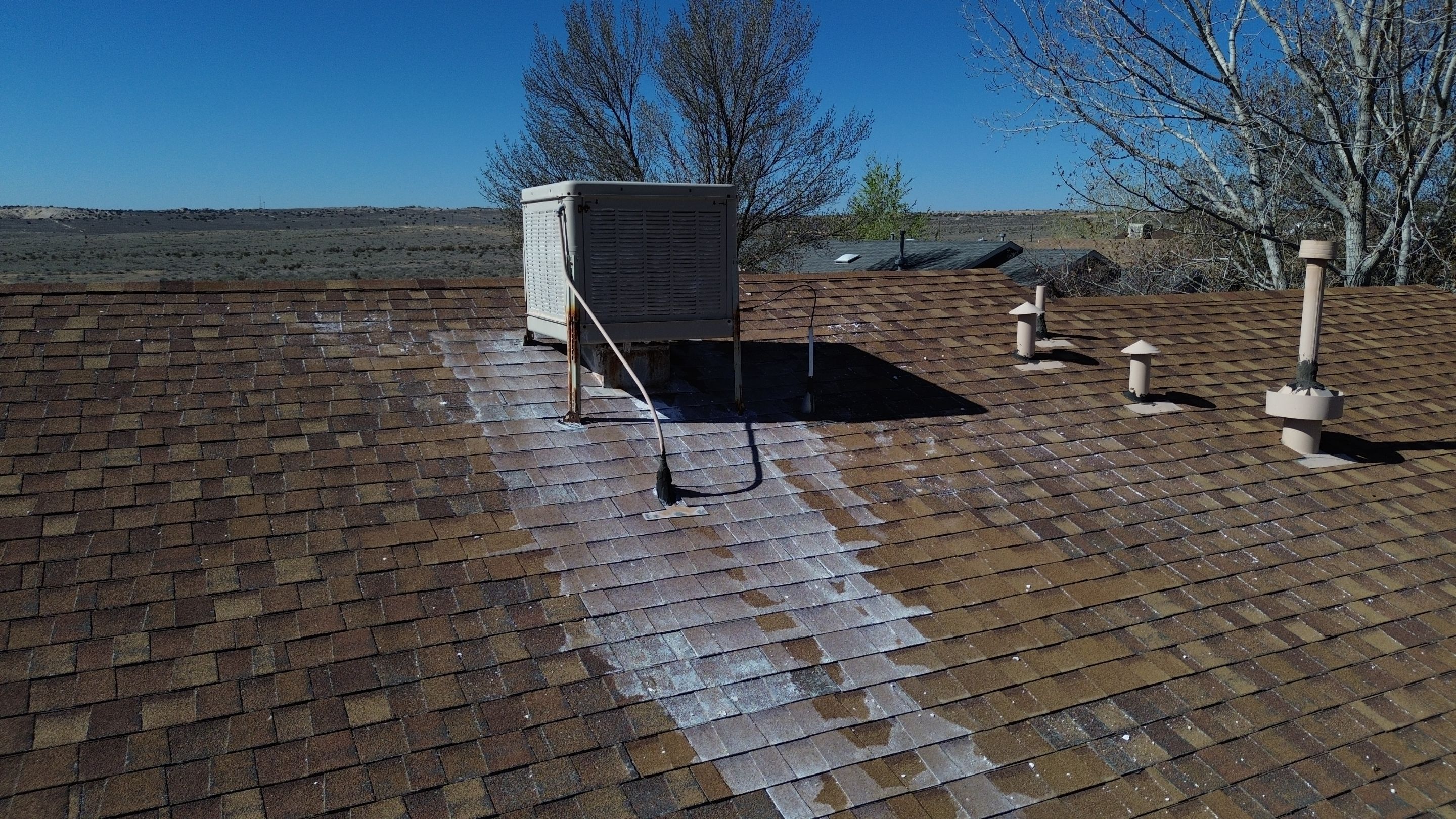 Oakridge Desert tan shingles in Chimayo Meadows by Doyle Roof Masters Inc