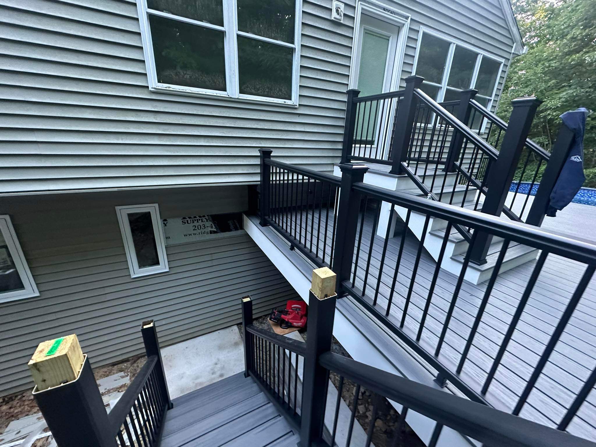 Pool Deck replacement, Trex Tropical Island Mist , Black Transcend railing. by DiGiorgi Roofing and Siding Inc