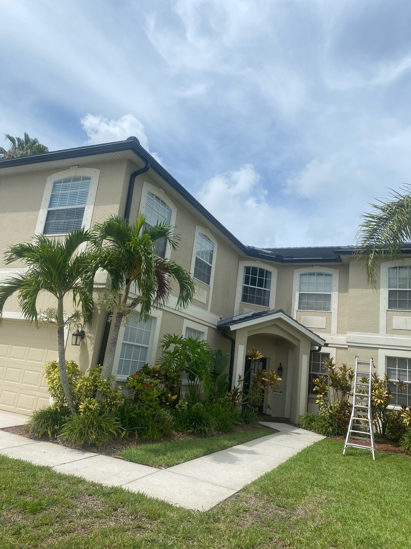 Black Seamless Gutters for Modern Homes in Osprey FL by Gutter Professors