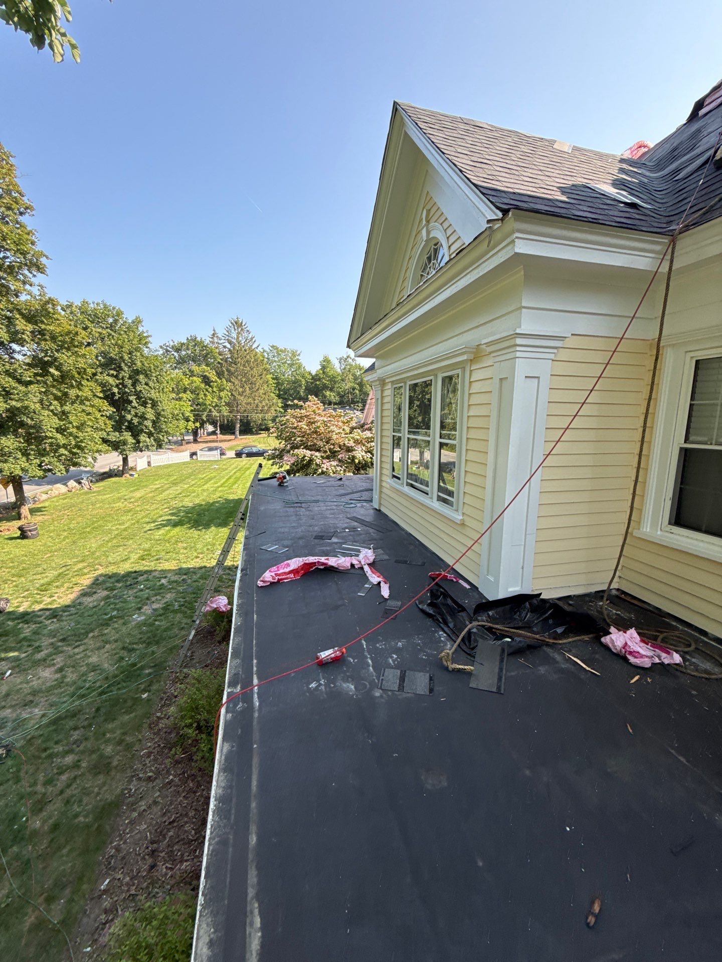 Full Roof Replacement & EPDM Restoration – North Andover, MA by Mighty Dog Roofing of Greater Middlesex County