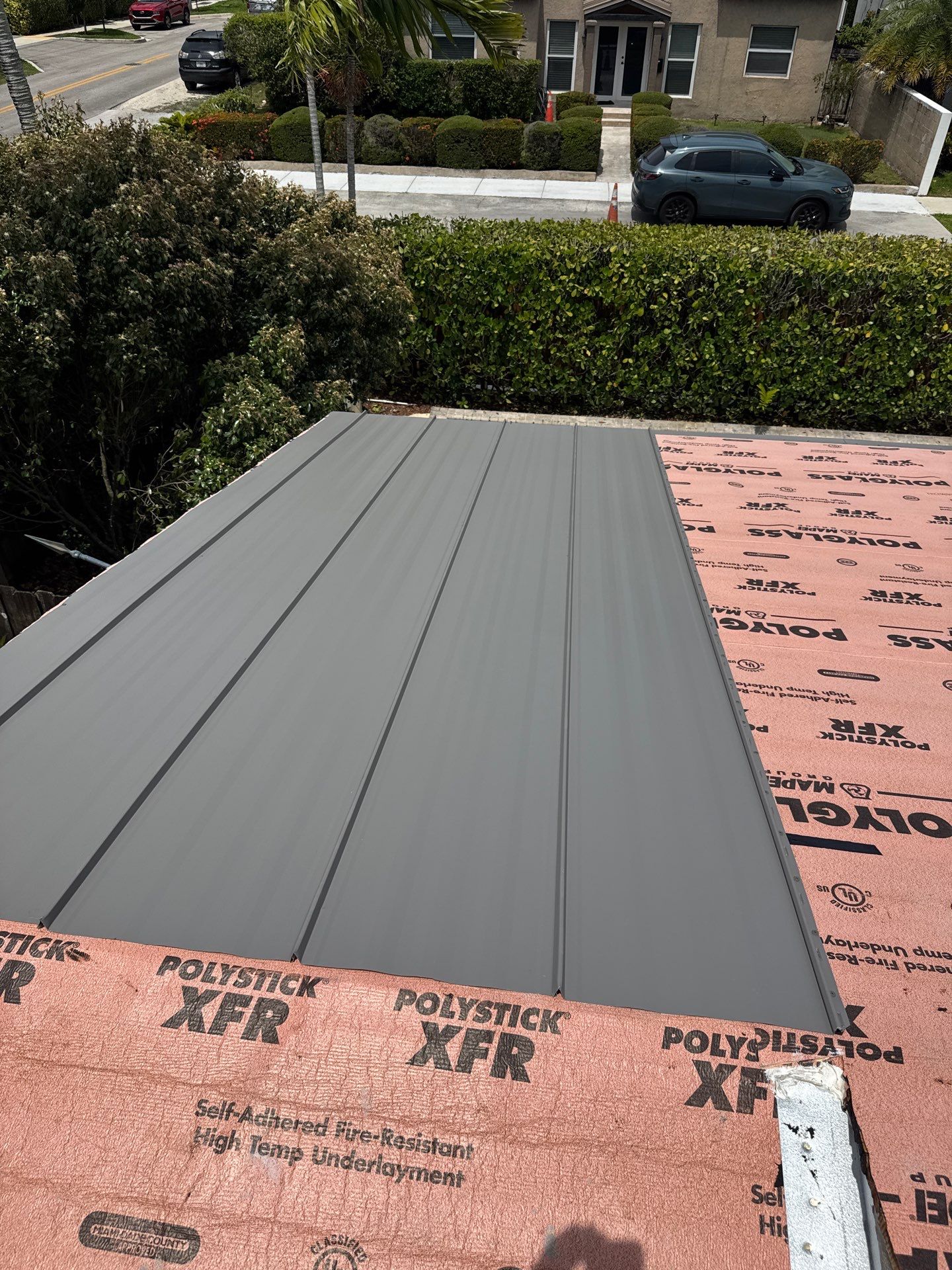 Residential Roofing Installation using 1" Nail strip metal roof by BLUES BROTHERS ROOFING