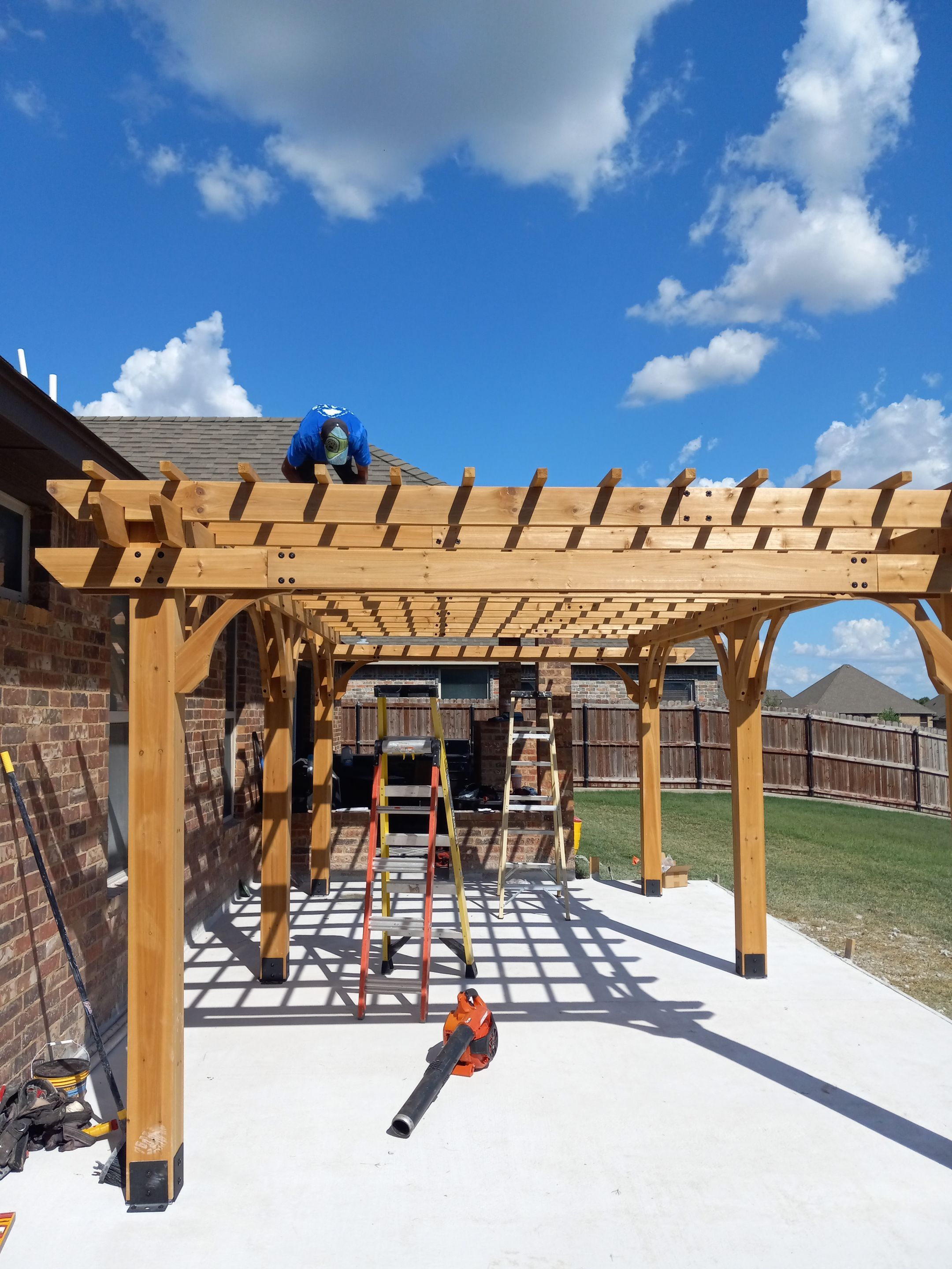 Concrete slab with Pergola by Clays Services Inc