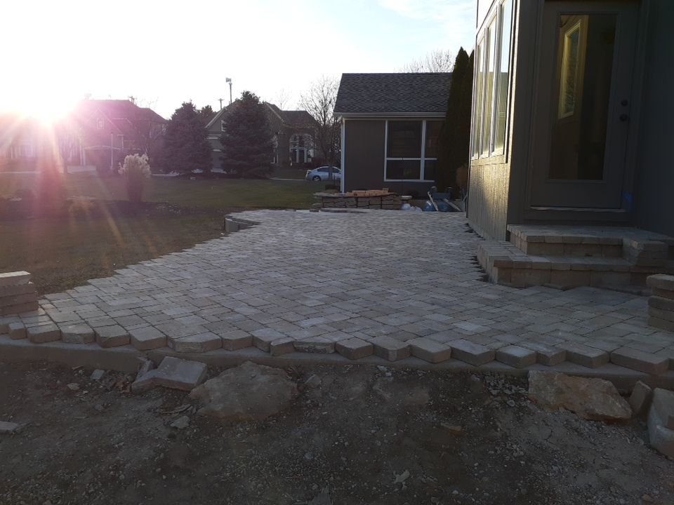 Back Yard Paver Patio by LAND ESCAPES LLC