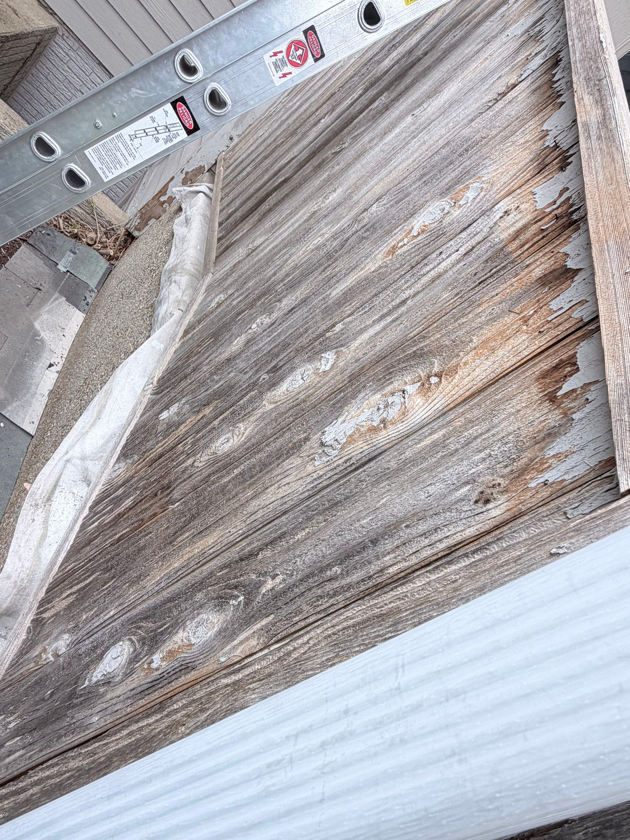 Exterior Siding and Trim Painting for Sioux Falls Residence by Select Painting, Coatings & Garage Cabinets