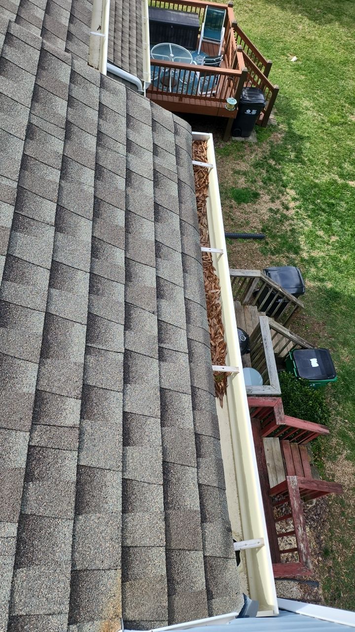 Gutter Cleaning using water by Power Wash Masters LLC