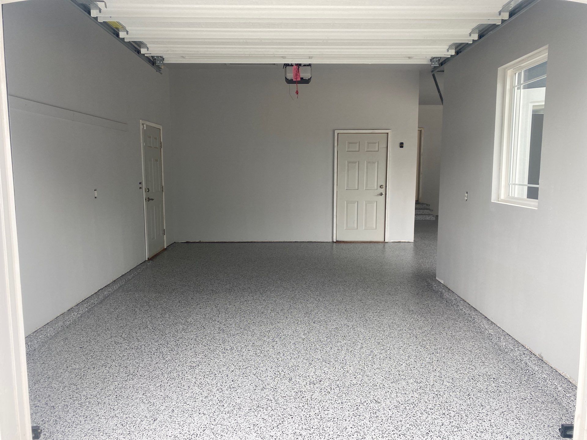 Dennis P. upgraded his garage and patio with a new flake floor by Banner Garage