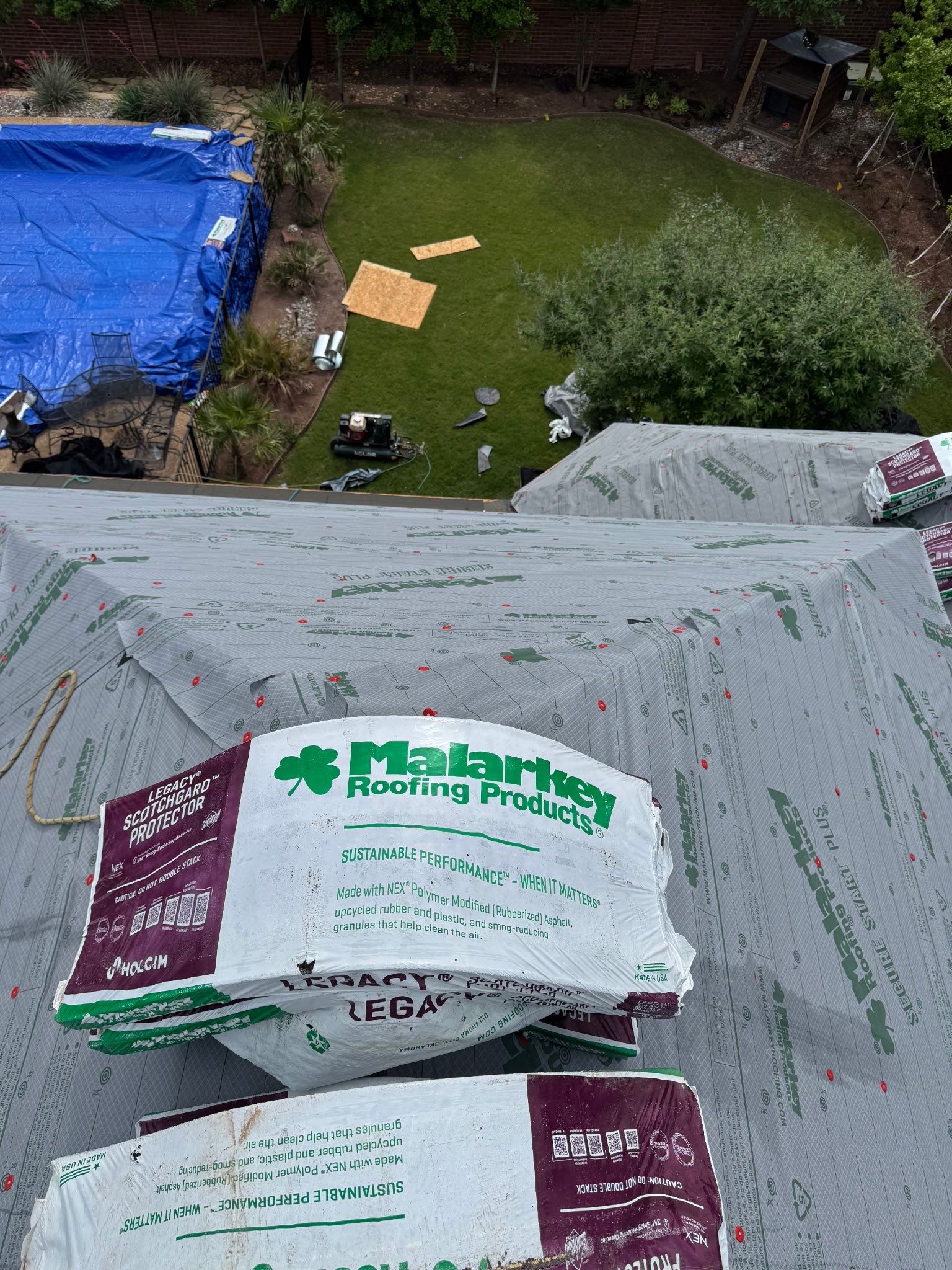 Residential Roofing Installation using Malarkey Legacy Scotchgard Shingles by Harvey Roofing & Construction