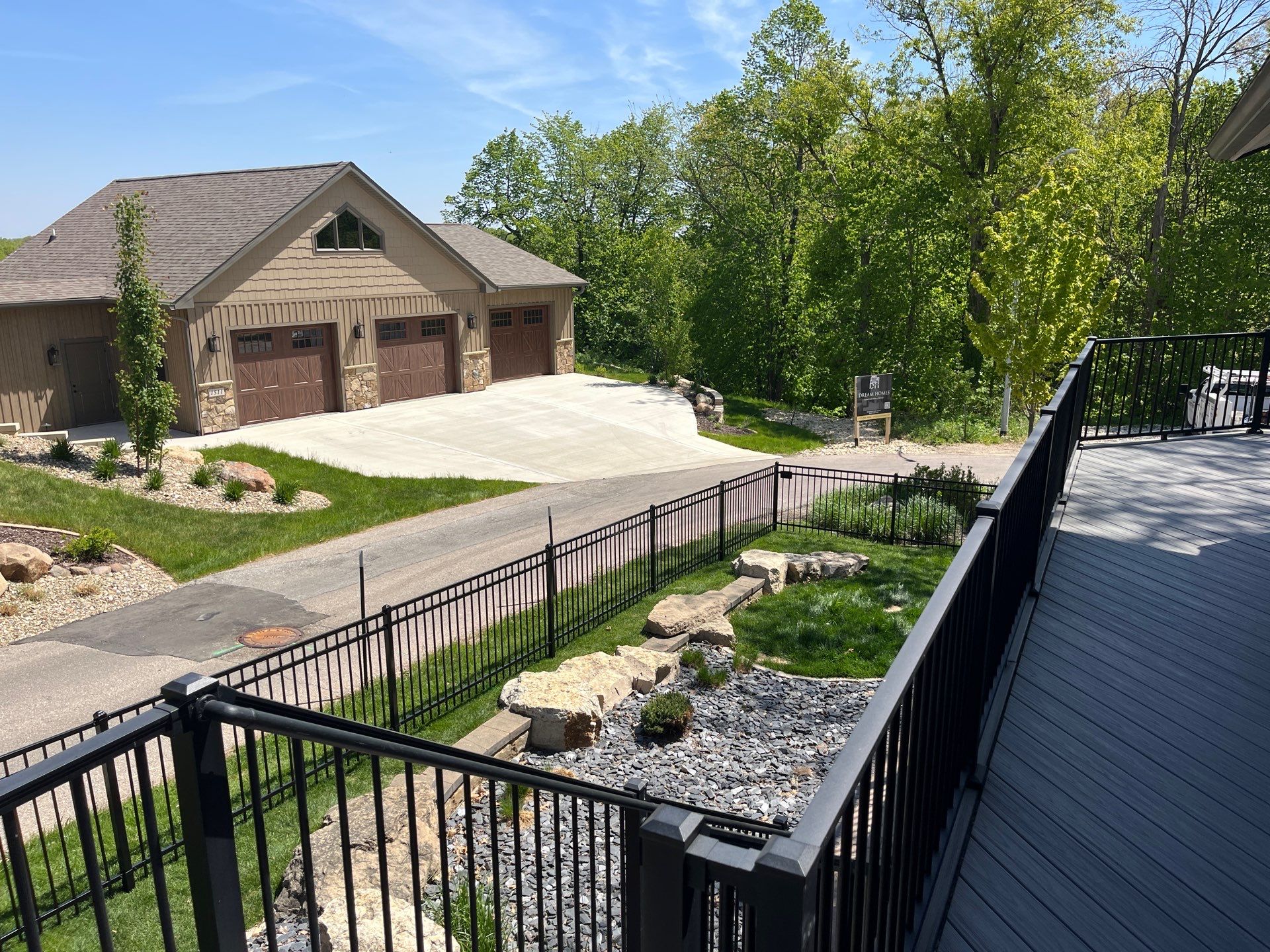 Ornamental Black Metal Picket Fence Installation in Cedar Falls by Perfect Picket Fence and Stain