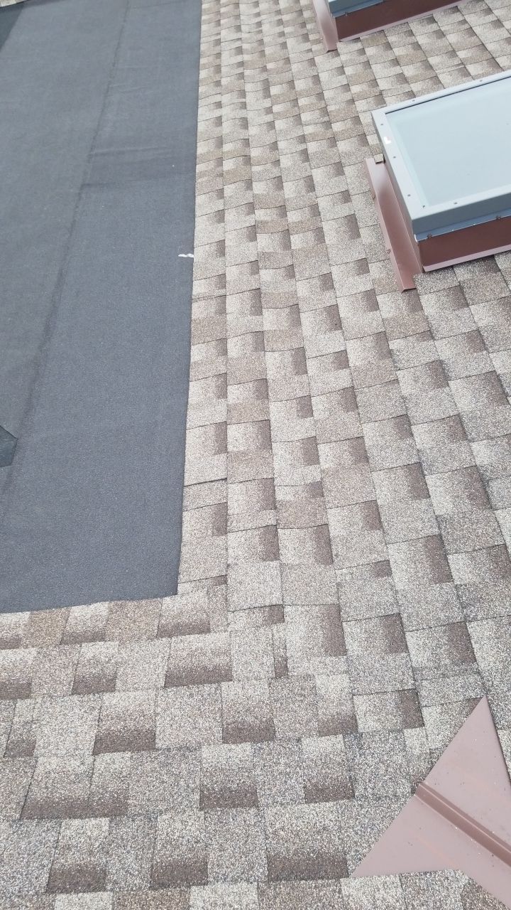 Skylight removal and install  by Absolute Roofing and Construction