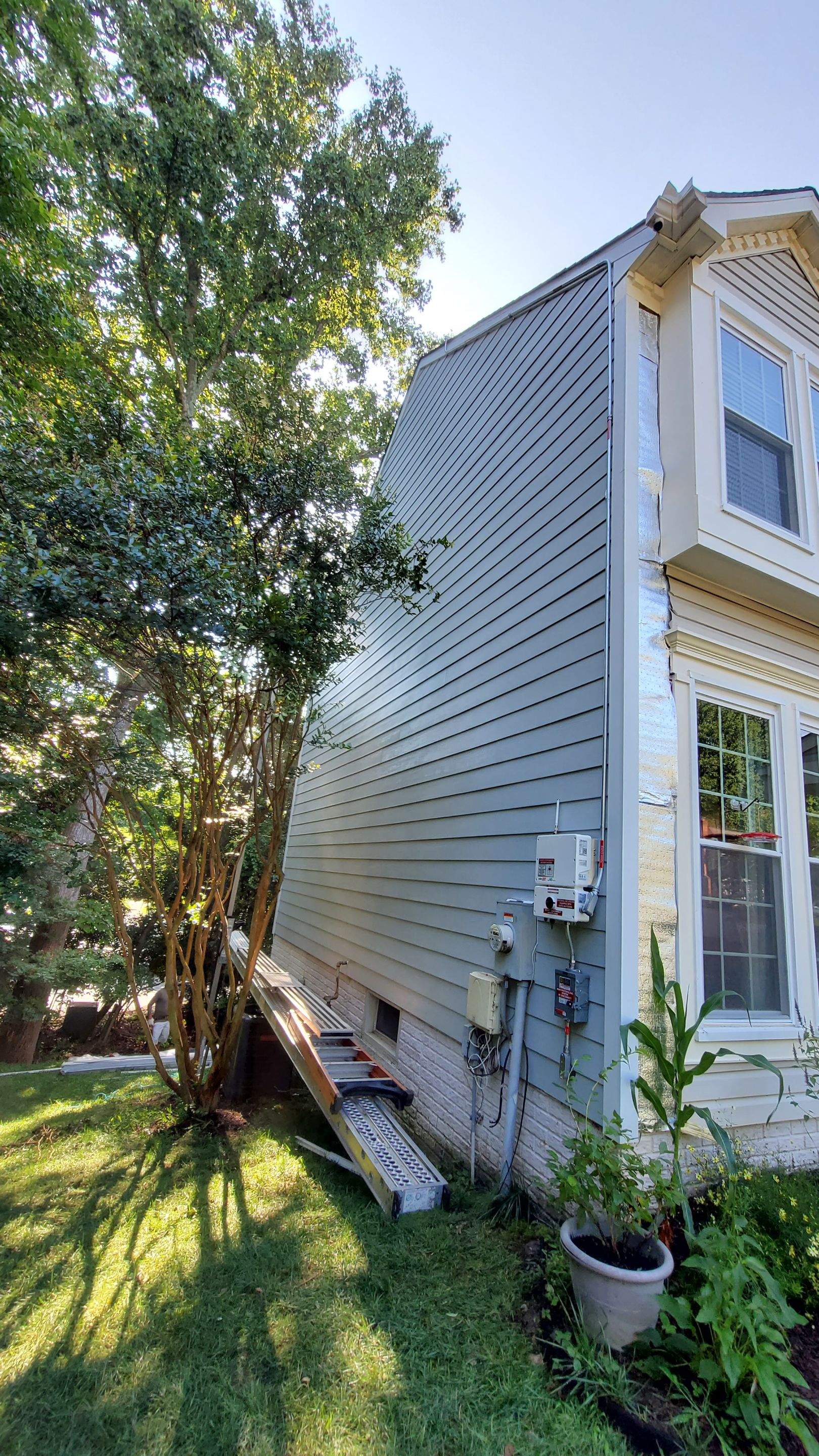 Exterior Home Makeover using GAF Timberline HDZ, GAF Decotech, and James Hardie Siding by American Home Contractors