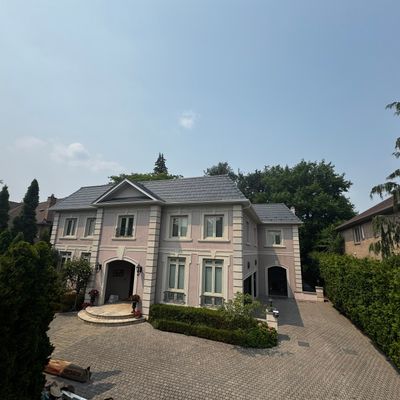 Residential Roofing Installation using Vicwest True Natuer. Metal Shingle