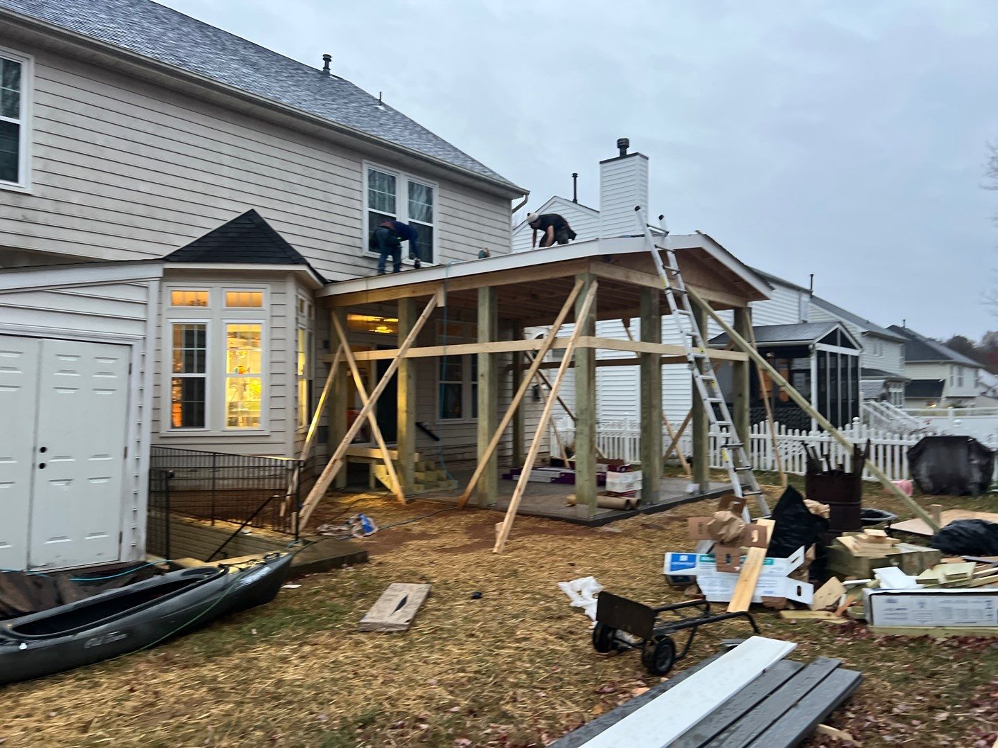 Custom Screened-In Porch with Stamped Concrete Patio in Warrenton by Jakari Restoration & Construction LLC