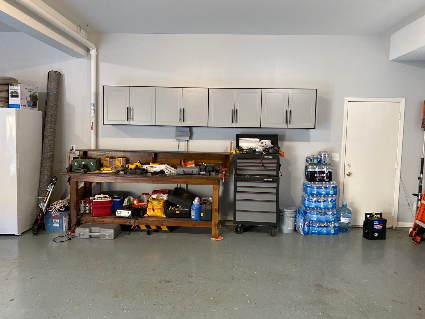 Don G. adds storage to his garage! by Banner Garage