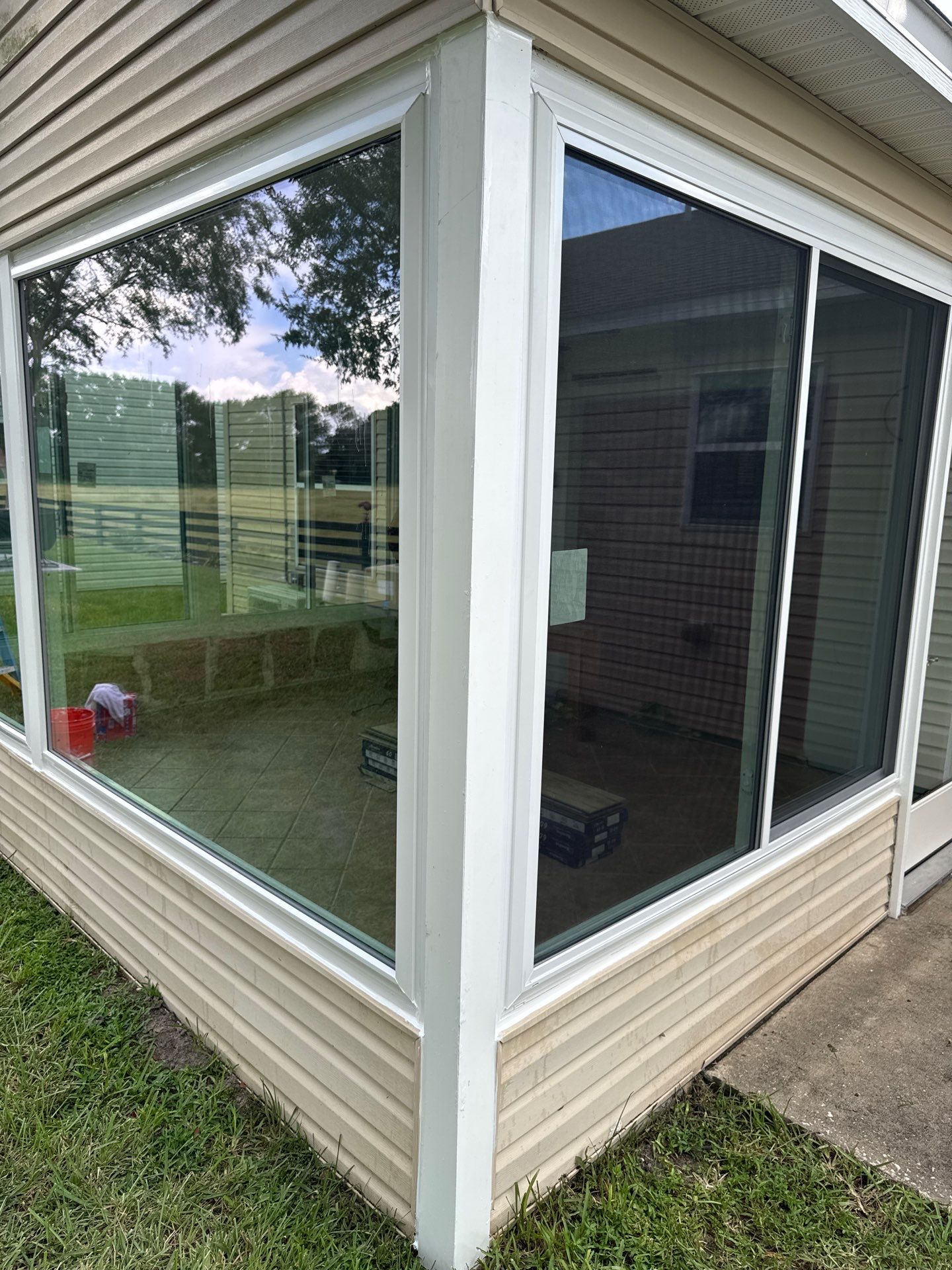 Sunroom Conversion with Alside Windows and Provia Door in The Villages by Windows & Doors Store