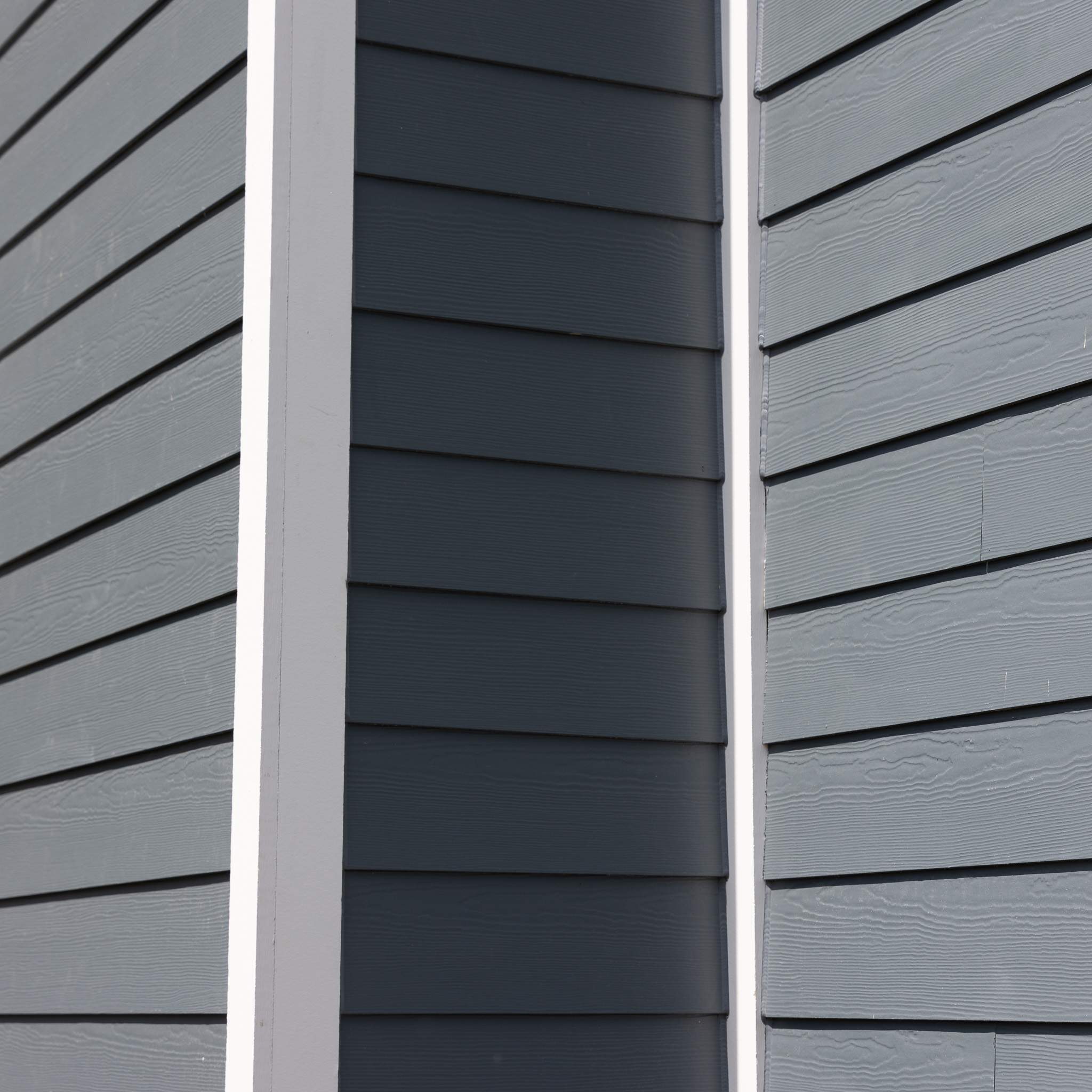 Evening Blue Hardie + Windows by Freedom Exteriors