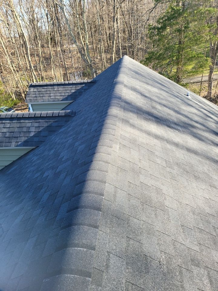 Residential Roofing Installation using onyx black by A Plus Exterior
