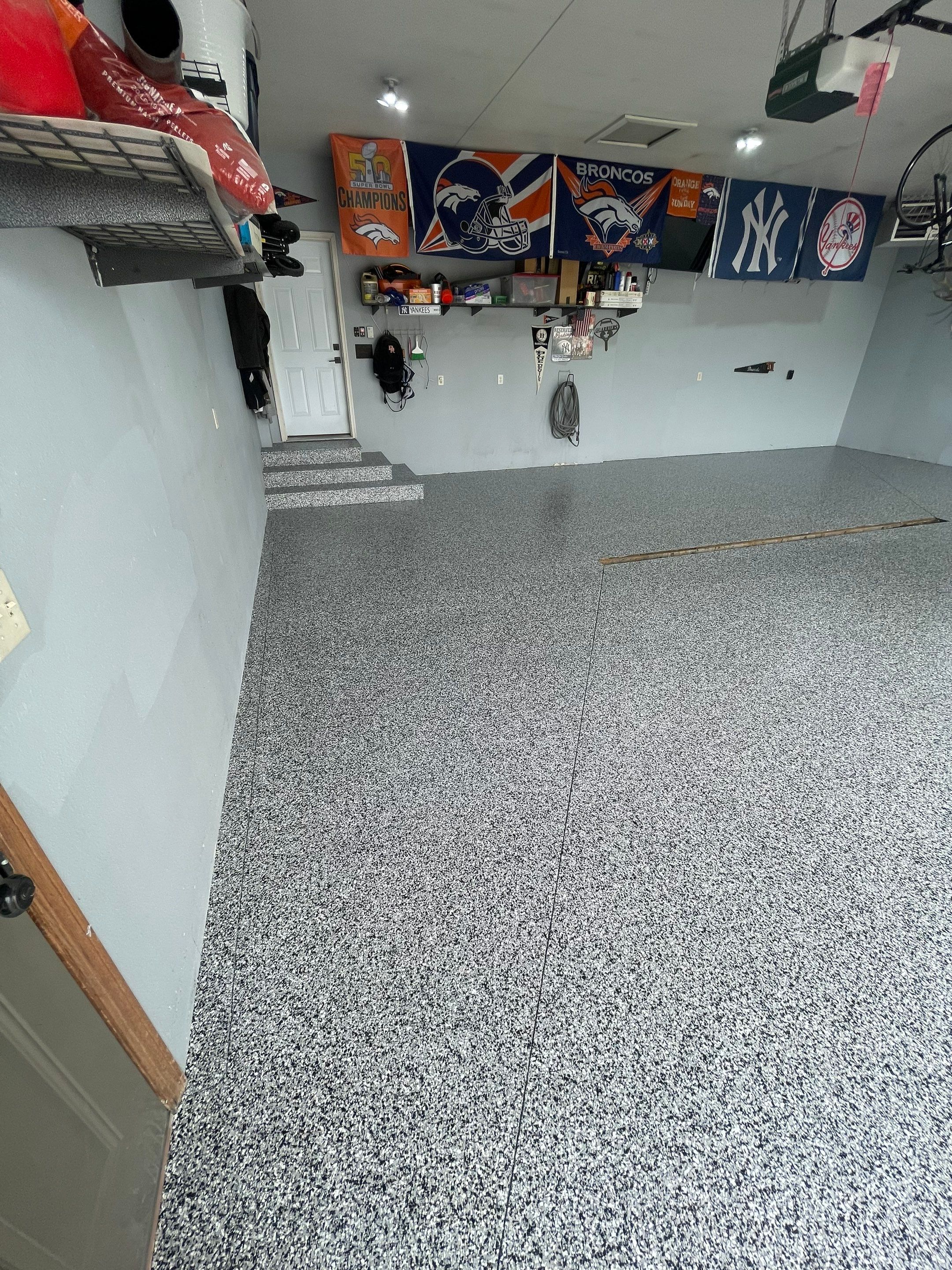 Full Garage Floor Epoxy Coating Installation in Dell Rapids by Select Painting, Coatings & Garage Cabinets