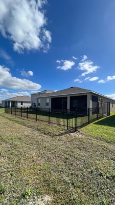 Aluminum Fence Installation using Black 3 Rail Aluminum Fence