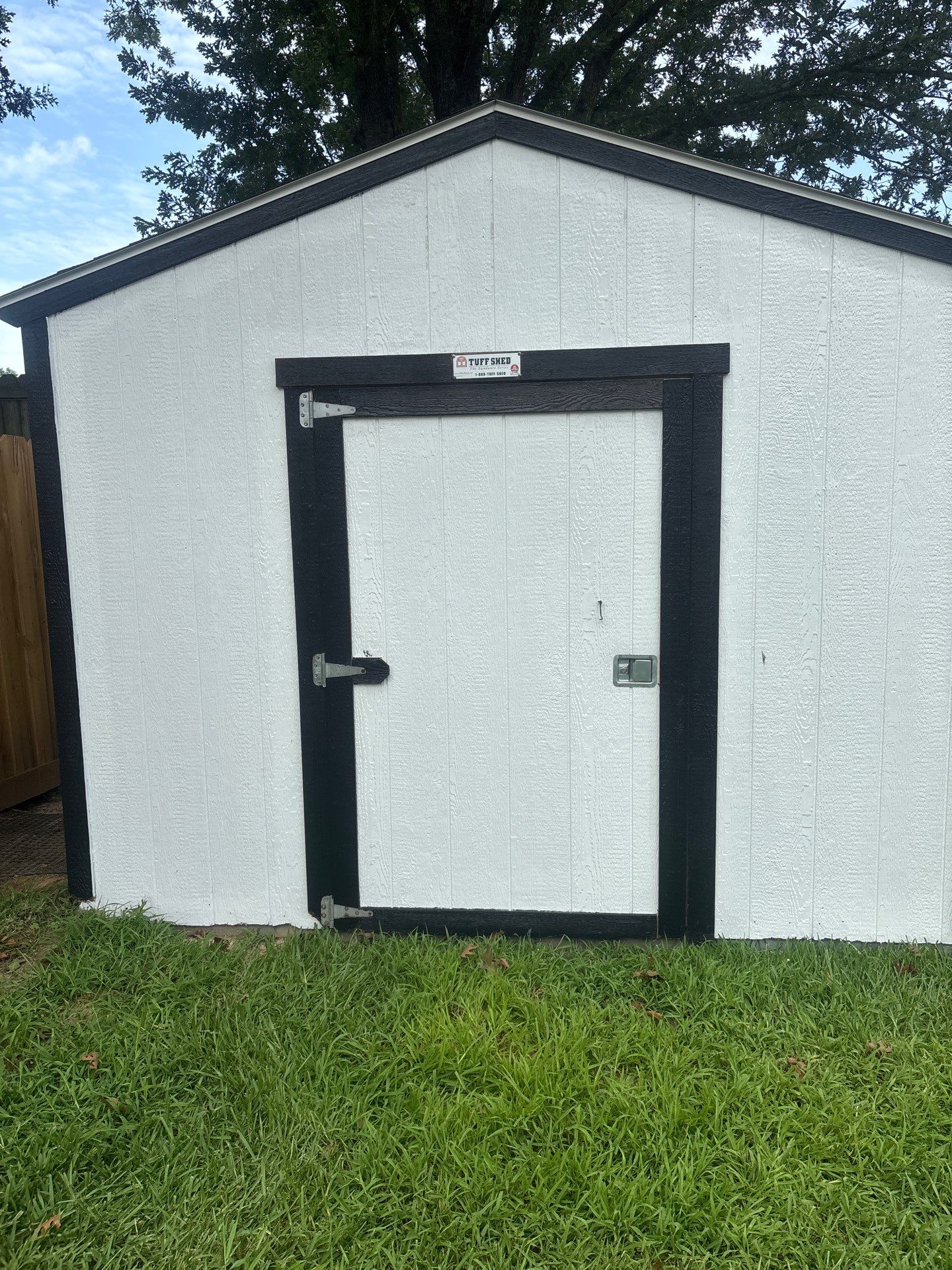Project in TylerExterior Painting in Tyler, TX | White Brick Home, Varnished Fence & Shed Painting by Quality Coats Painting