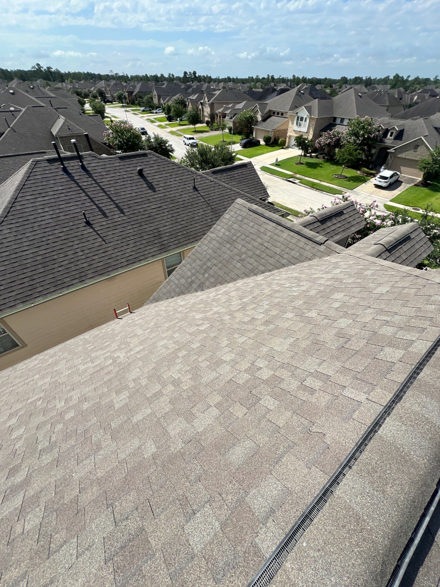 Hail Damage using Owen's Corning Duration (Lifetime) Shingles by Roof Repair Company