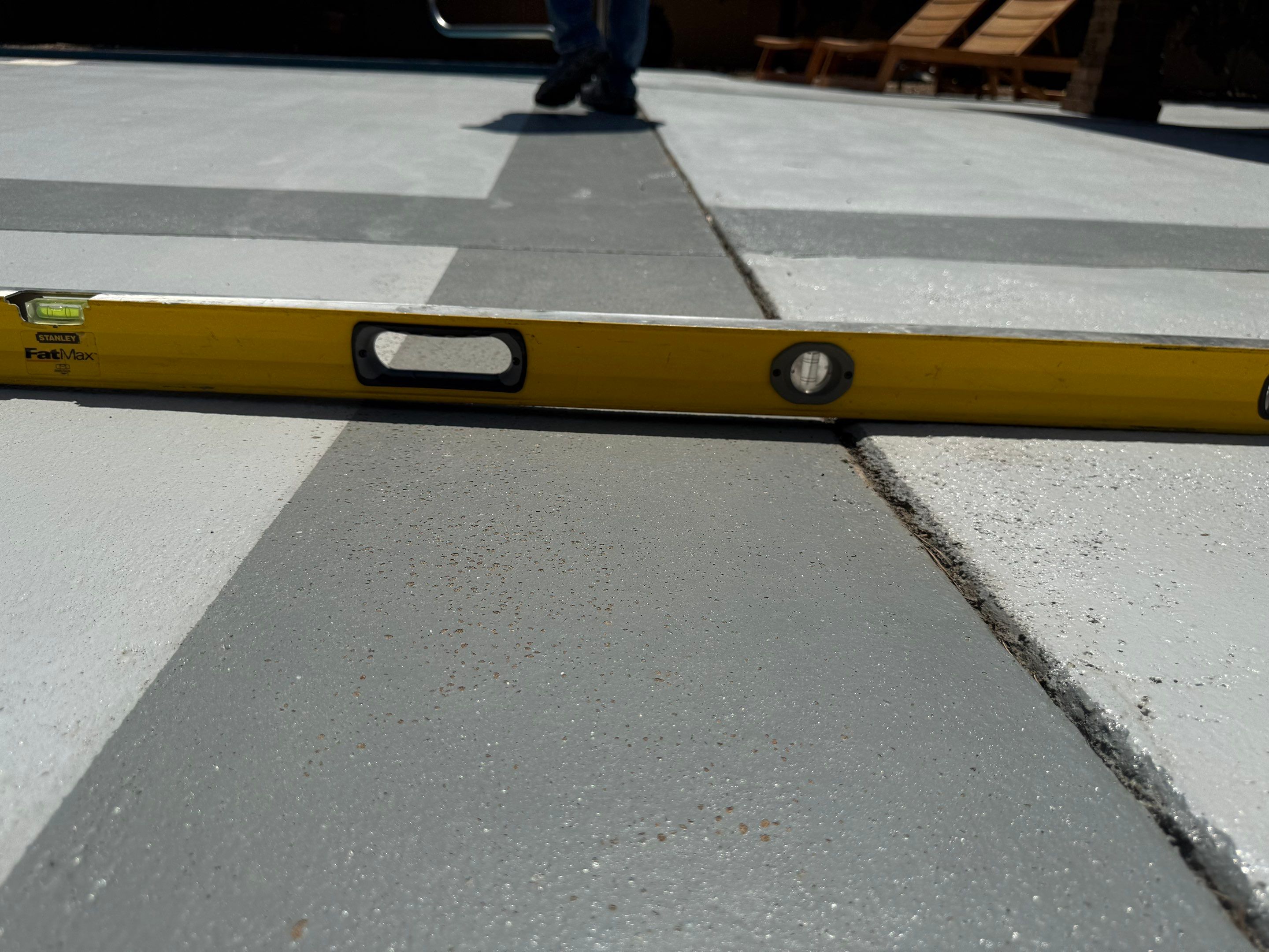 Decorative Concrete Pool Deck and Patio Resurfacing in Sioux Falls by Select Painting, Coatings & Garage Cabinets