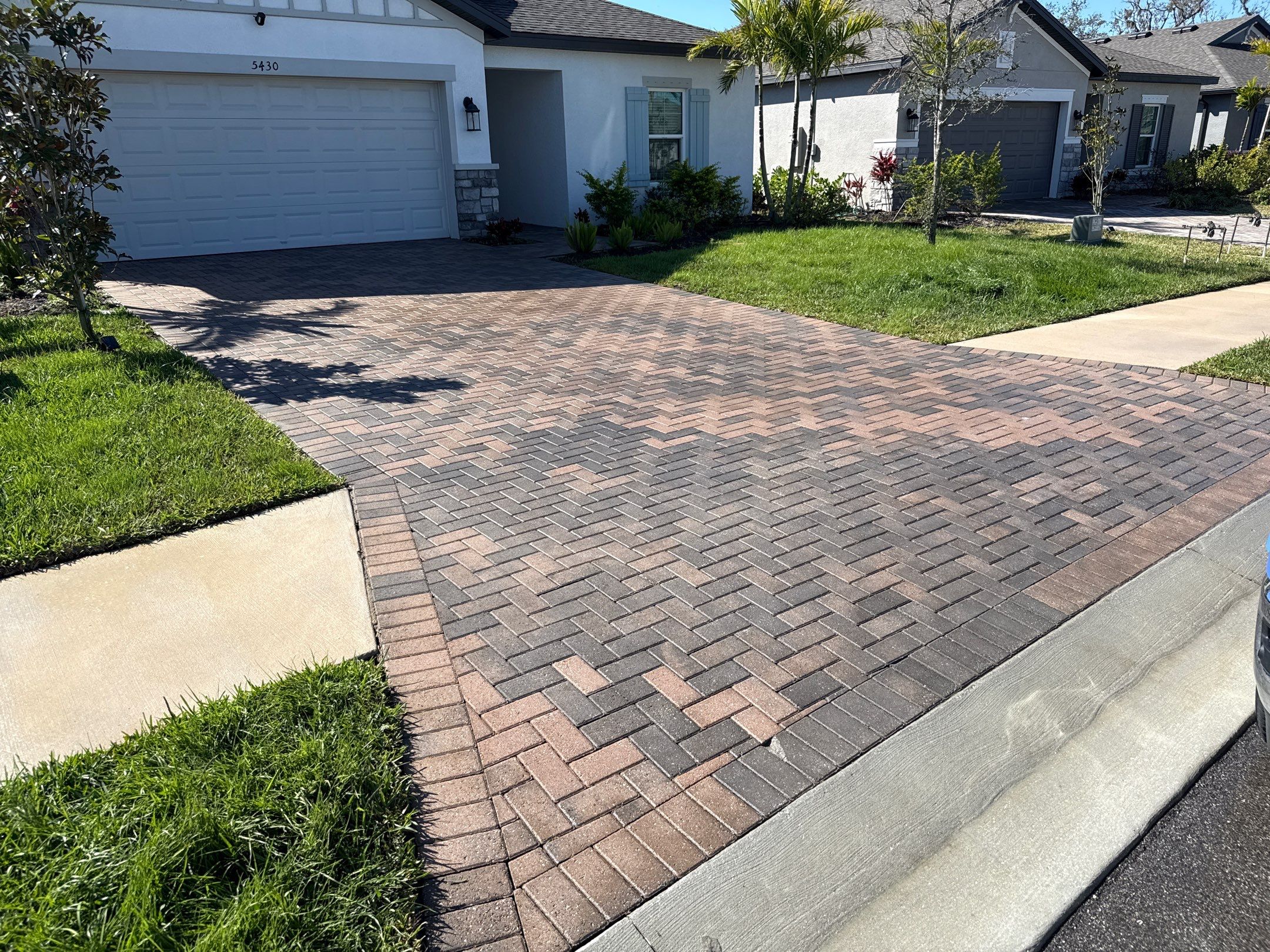 Paver Driveway Cleaning, Oil Stain Removal & Sidewalk Cleaning in Trevesta – Palmetto, FL by Sunshine AquaWash