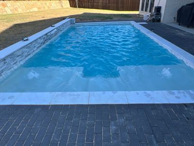 Modern Rectangular Pool with Tanning Ledge