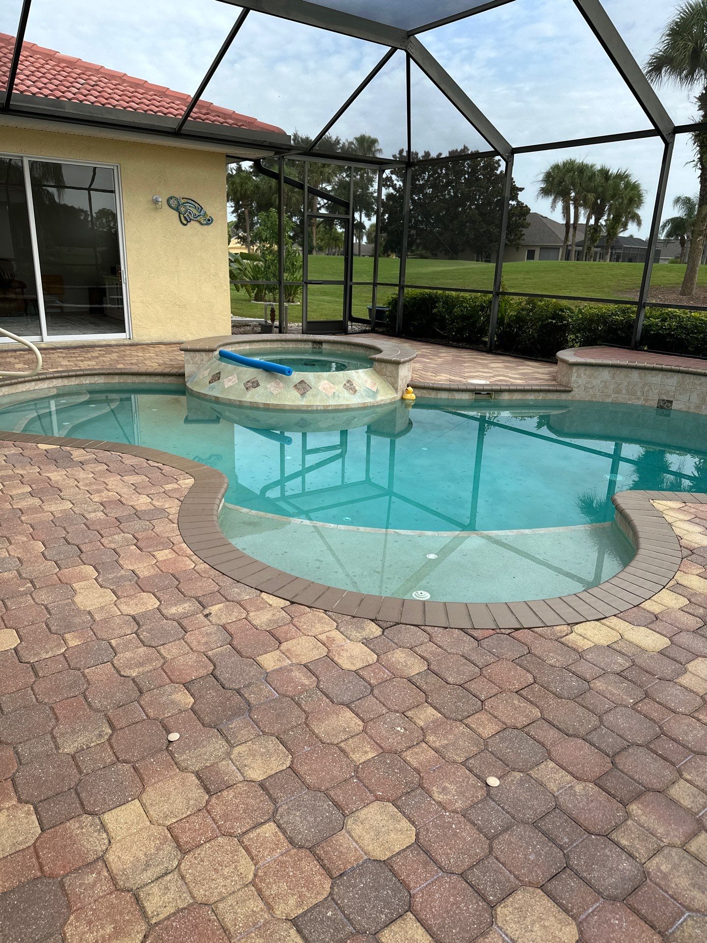 Paver Cleaning and Sealing pool deck in Sun City Center by Supreme Paver Experts