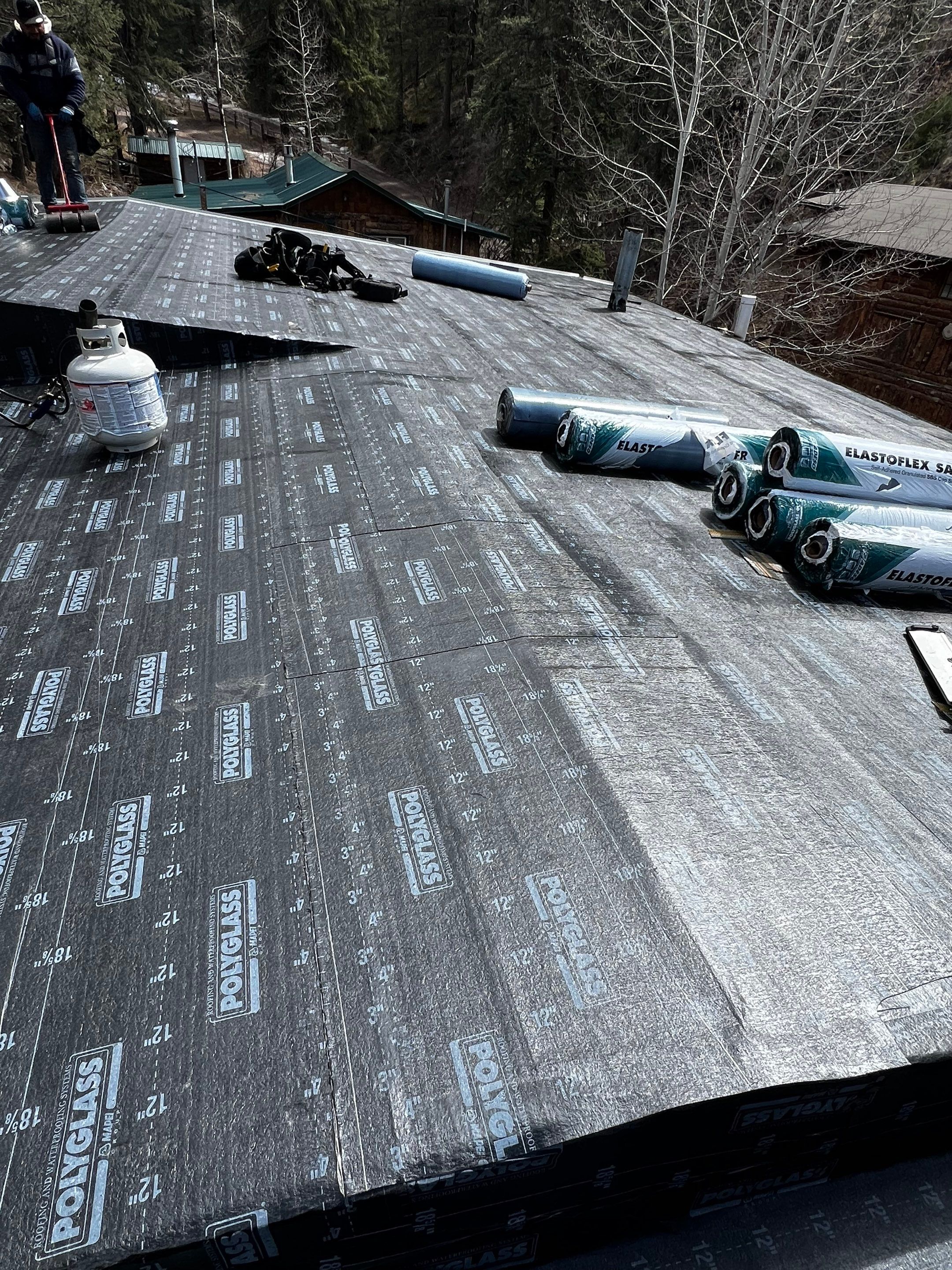 Residential Roofing Installation using Modified Bitumen Roofing by Blue Peaks Roofing LLC 