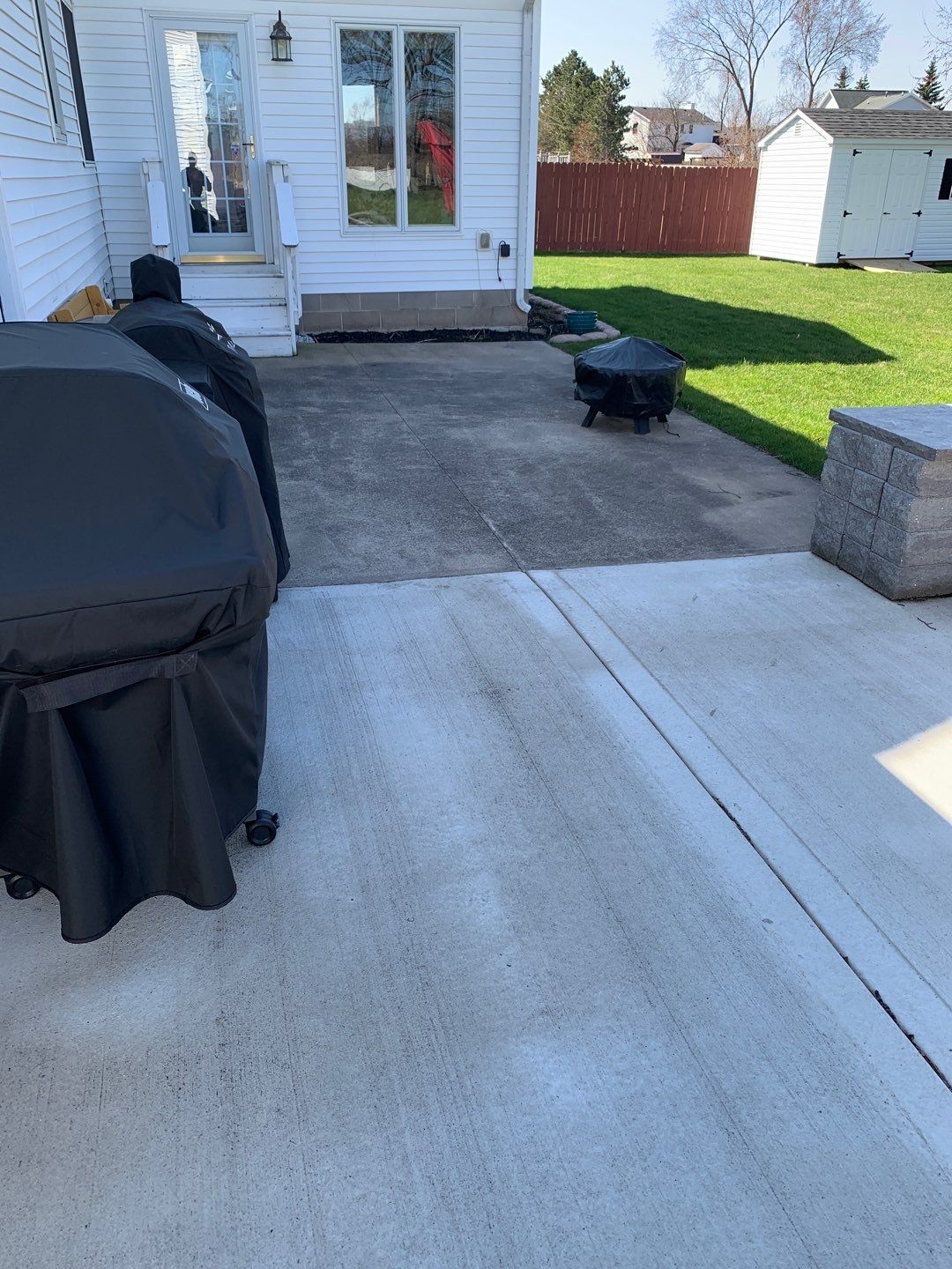 Silverado garage floor and patio coating  by NG Masonry & Construction LLC