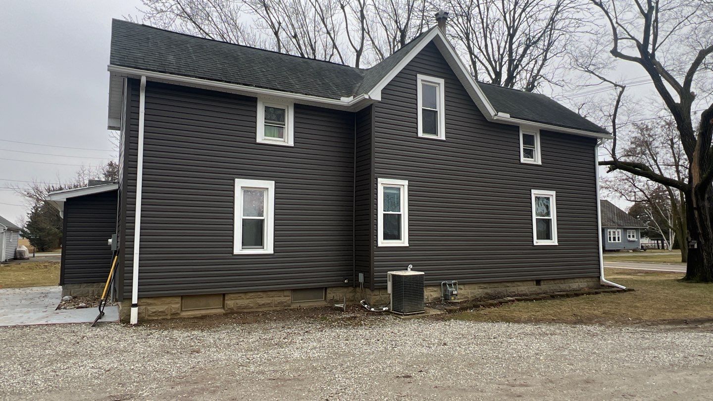 Residential fascia replacement using Exterior Portfolio 4.5 DL - Peppercorn by Nitro Roofing and Construction