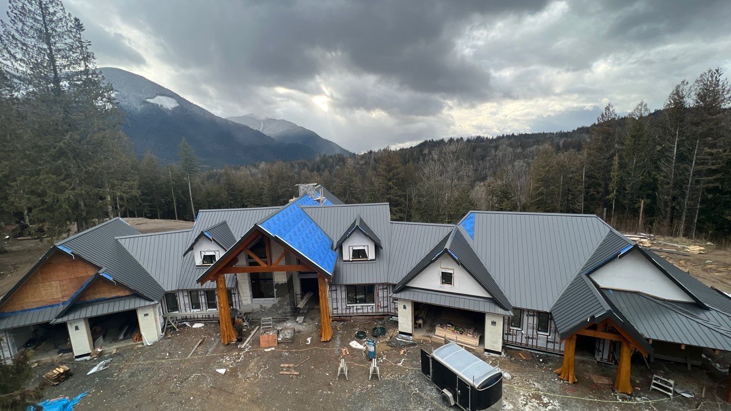 Residential Roofing Installation using 12" Prolok metal by Top Notch Roofing Inc