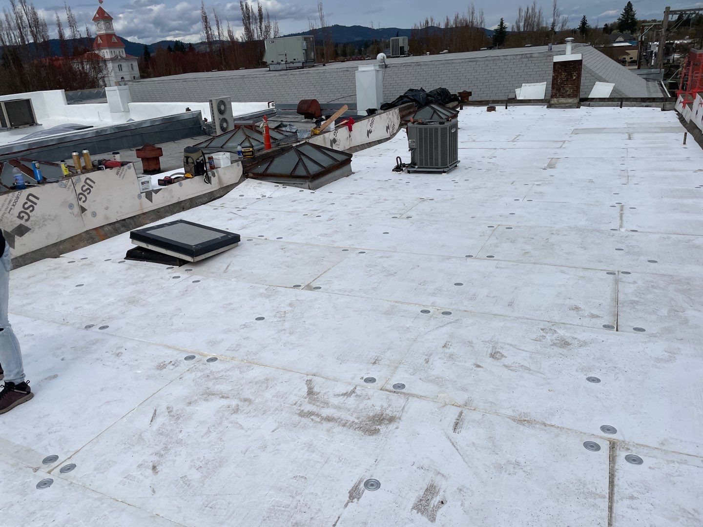 Commercial Flat Roof Installation using GAF 60Mil TPO  by Orezona Building & Roofing Company, Inc.