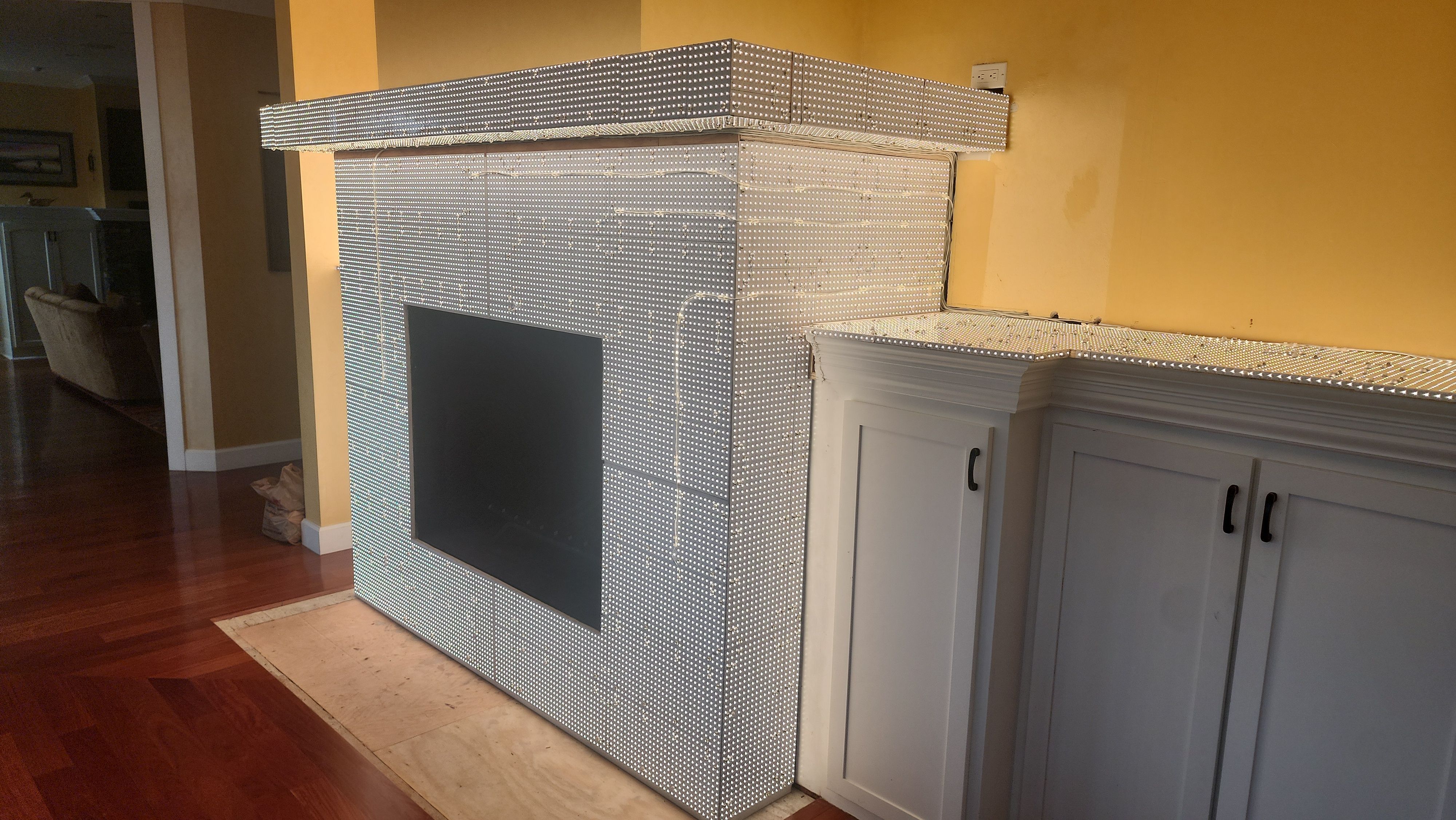Backlit Stone On A Fireplace by S.Y. Electric Inc.