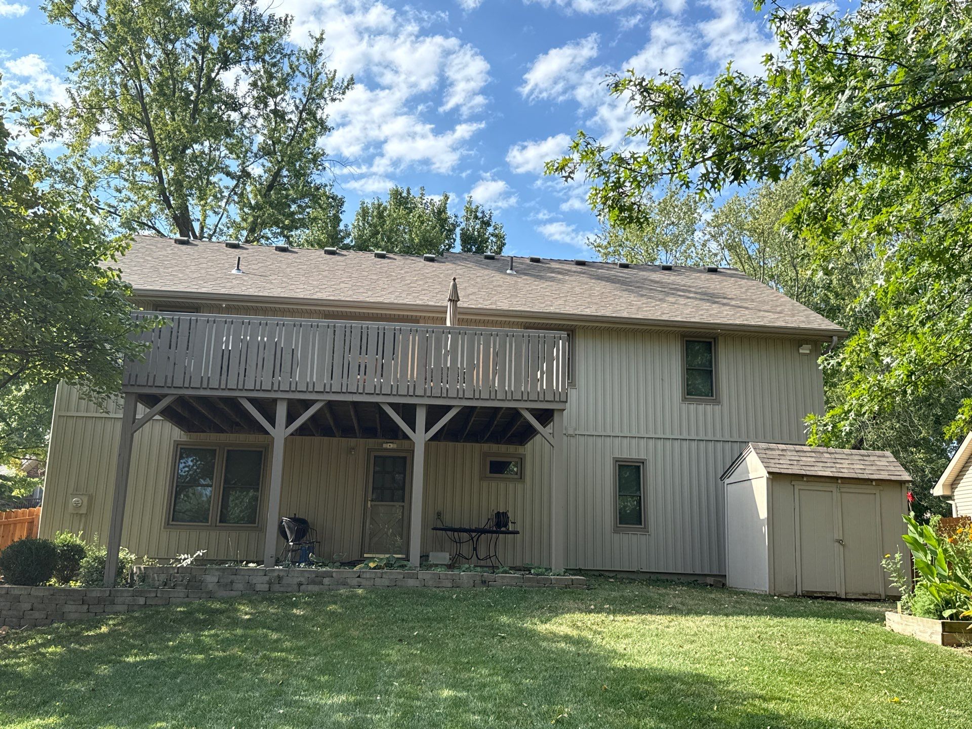 Comprehensive Kansas City Exterior Remodel Featuring Board And Batten Siding by EEC Windows, Siding & Roofing