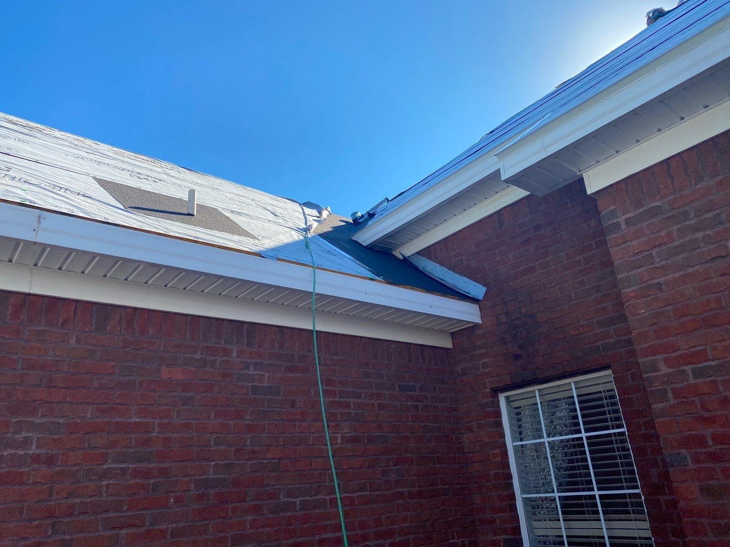 Residential Roofing Installation using Roof Replacement by American Roofing & Construction LLC