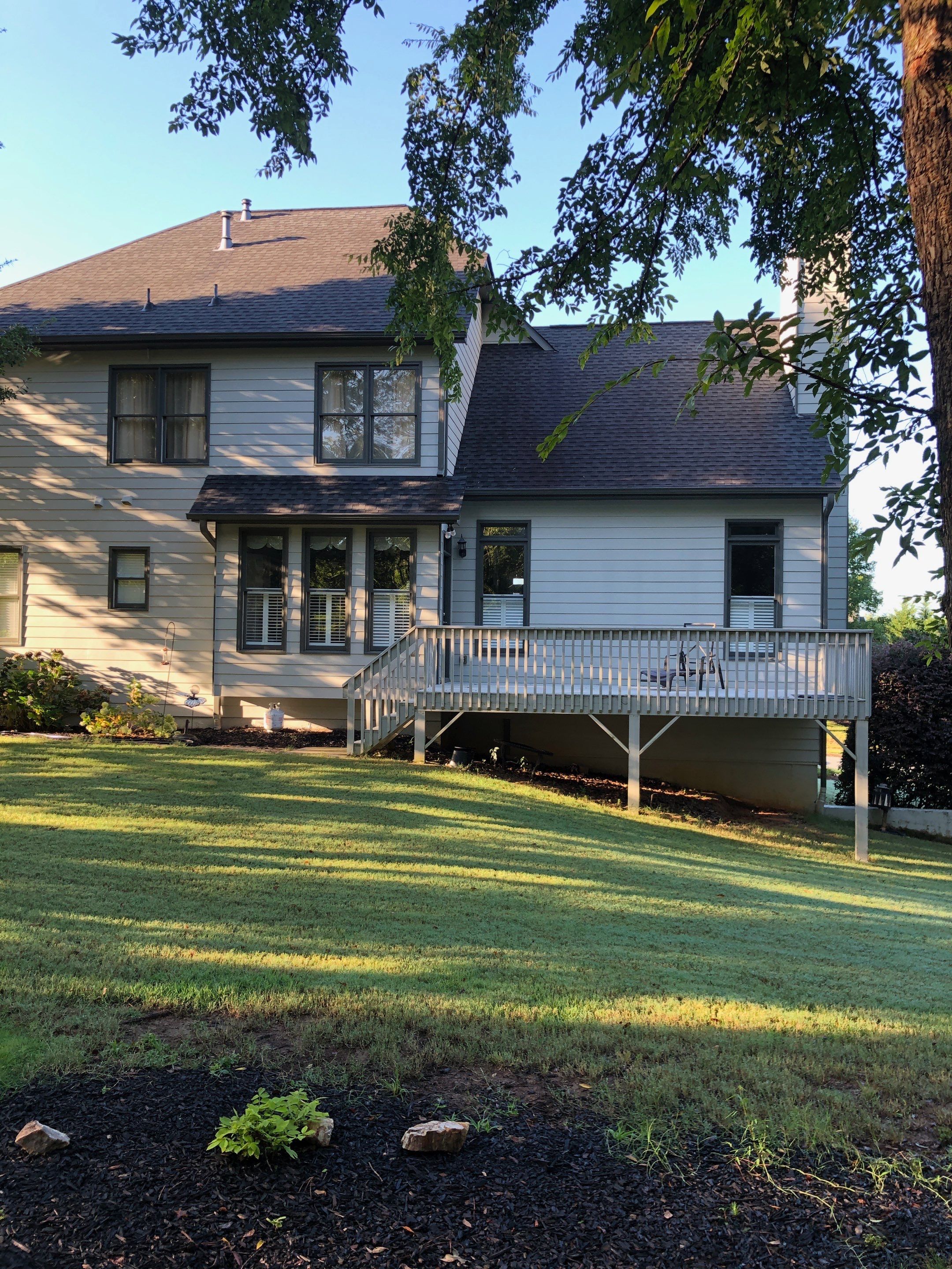 Custom Screened Porch Addition and Wood Deck in Acworth by Swift Home Renovations