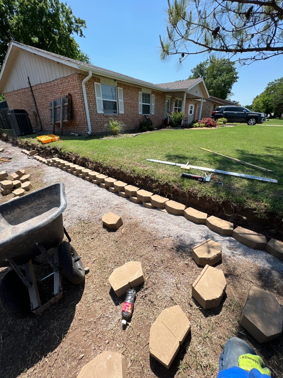 Retaining Wall using Rocks by Clays Services Inc