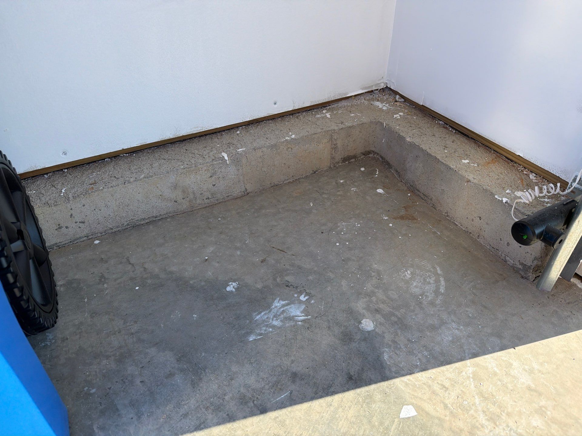 Sioux Falls Garage Floor Transformation with Cabin Fever Decorative Chips by Select Painting, Coatings & Garage Cabinets