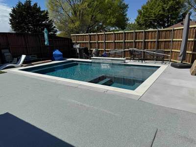 Geometric Pool with Raised Spa and Tanning Ledge