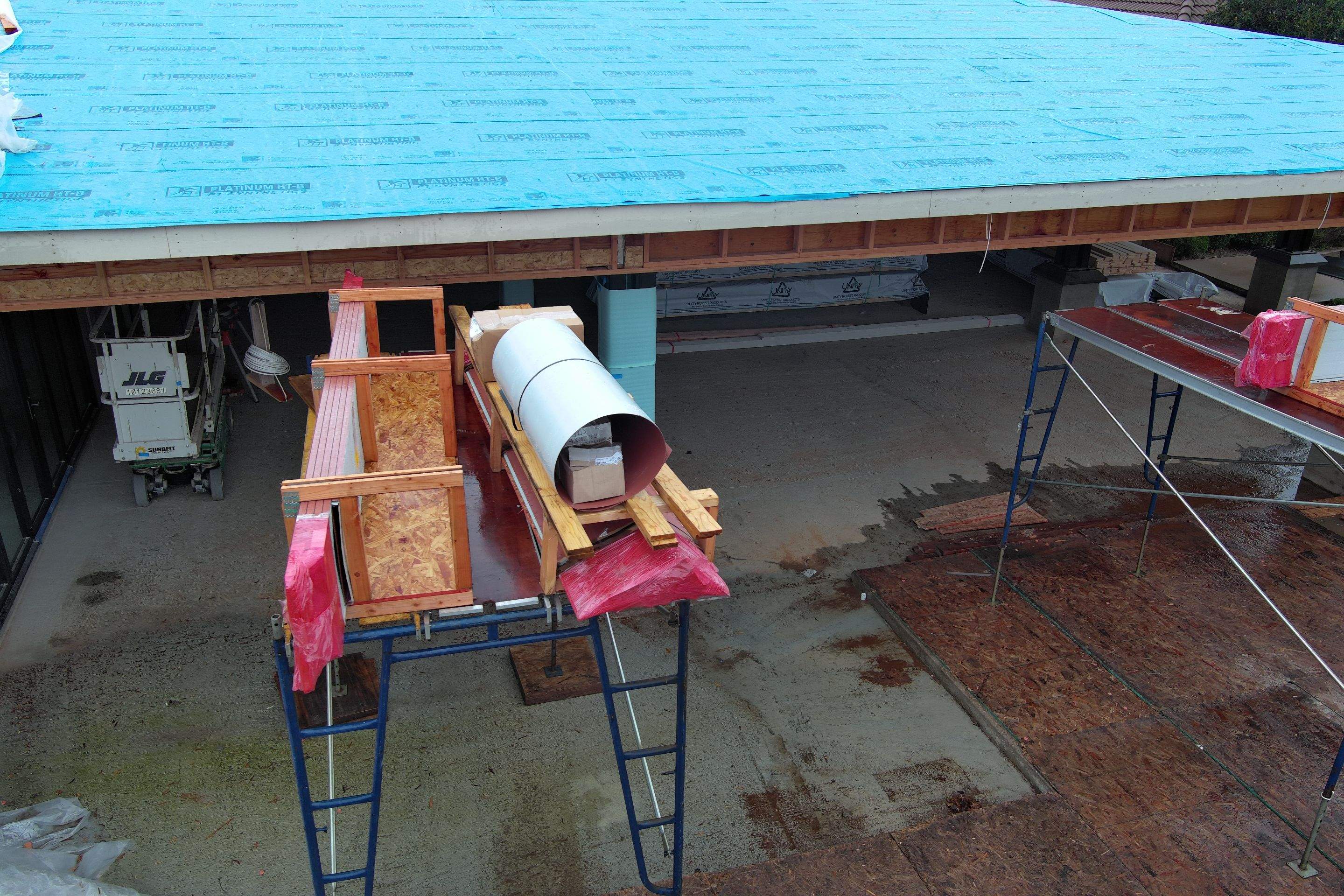 Tile, Metal, and TPO roofing project (new construction) by Straight Edge Roofing Inc