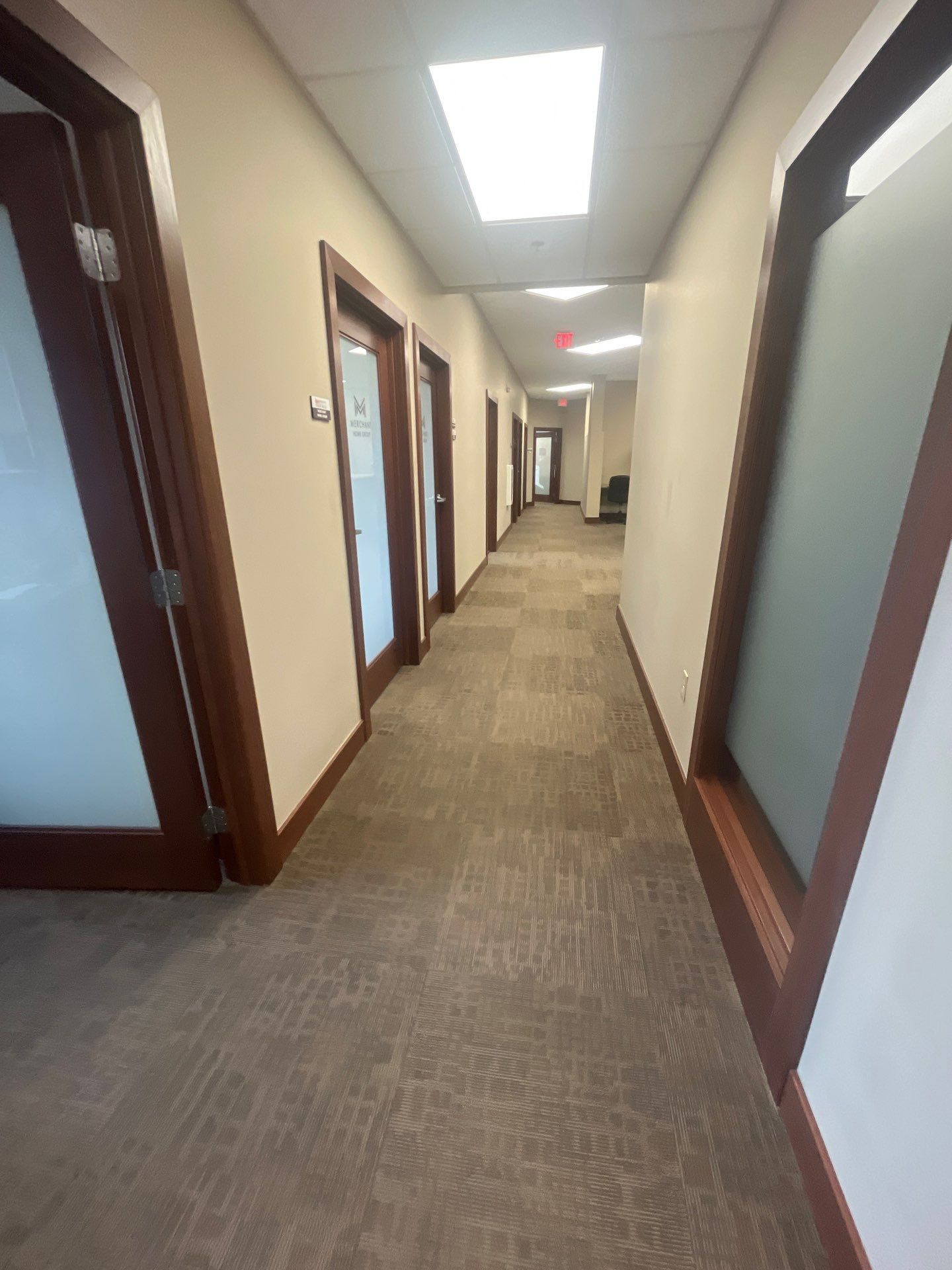 Commercial Office Interior Remodel and Modern Suite Refresh in Sioux Falls by Select Painting, Coatings & Garage Cabinets