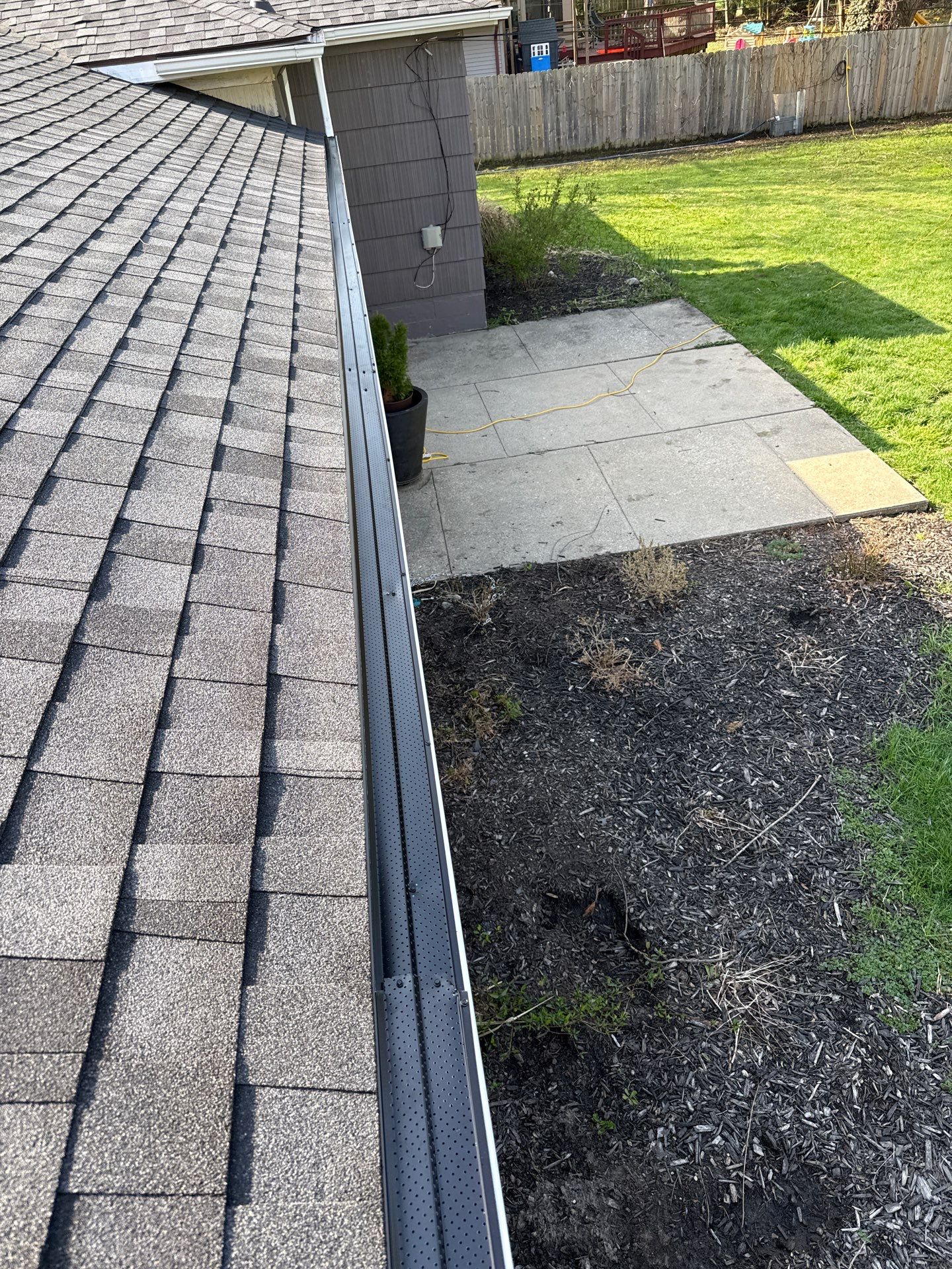 Leaf covers on existing gutters - East Lansing by Sunrise Seamless