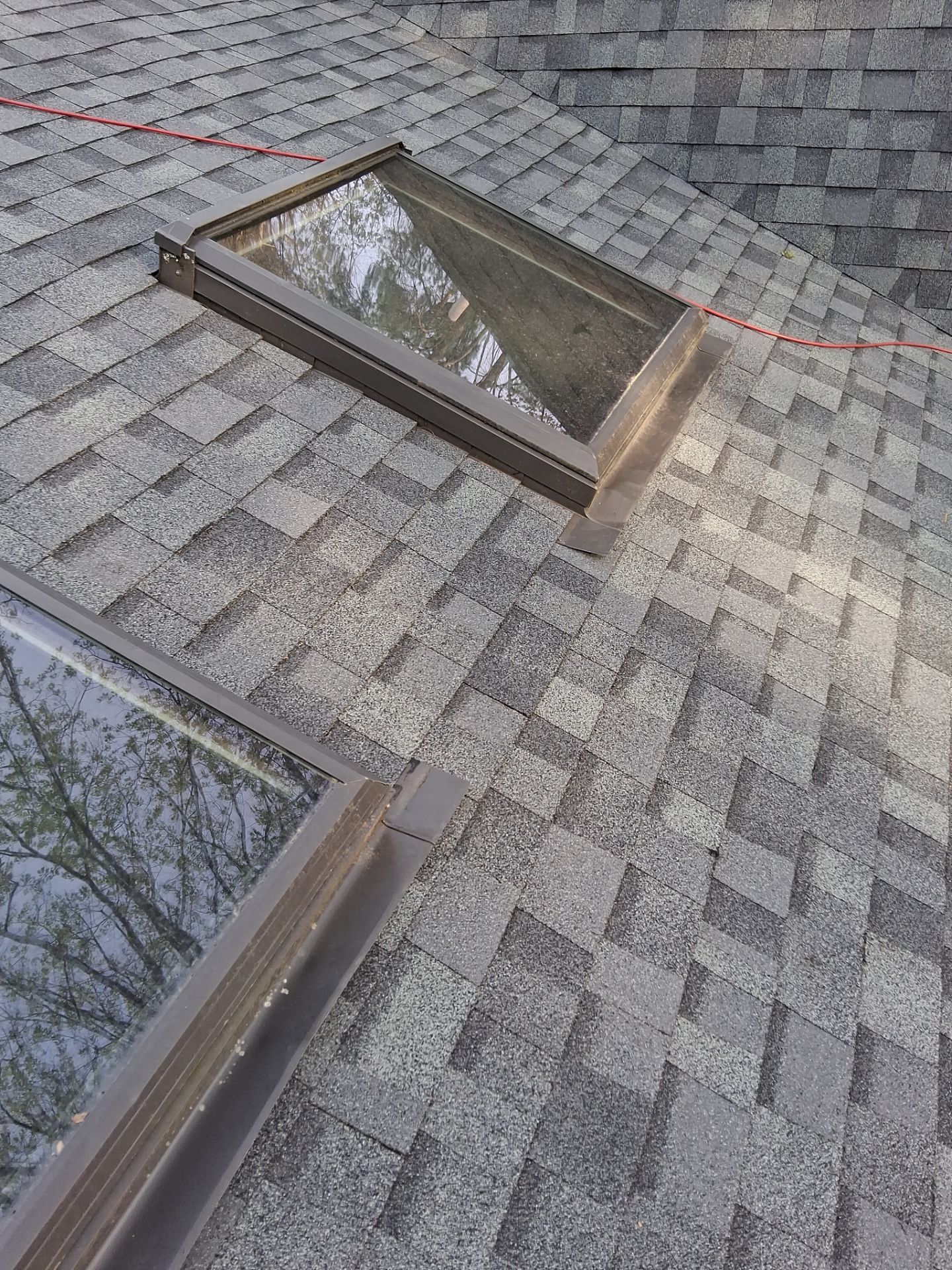 Asphalt Shingle Roof Replacement and Skylight Installation in Newport, NH by Tall pine roofing