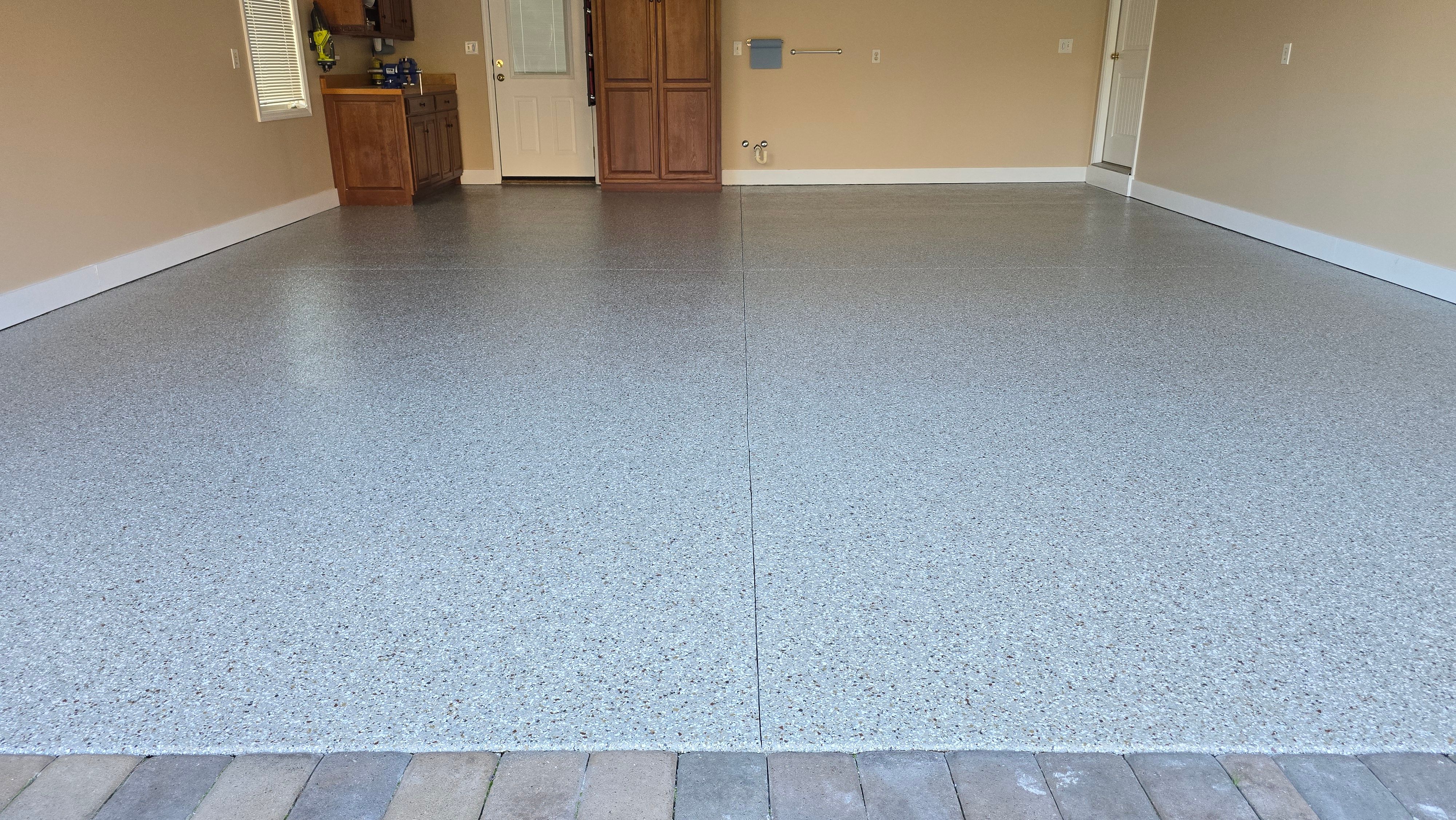 Garage using Creekbed by Elite Floor Solutions