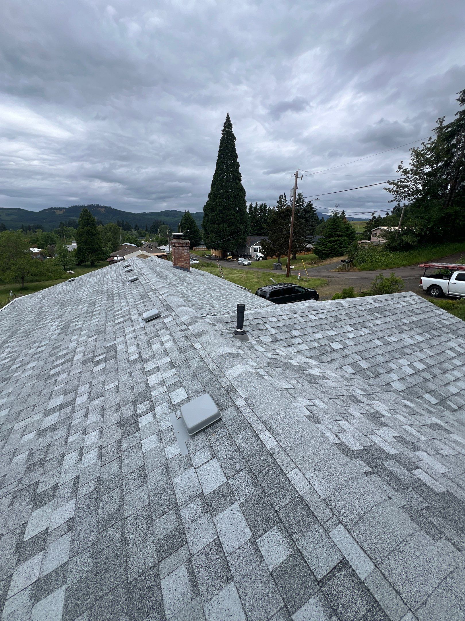 Residential Roofing Installation using IKO Dynasty (Color: Frostone Grey) by Orezona Building & Roofing Company, Inc.