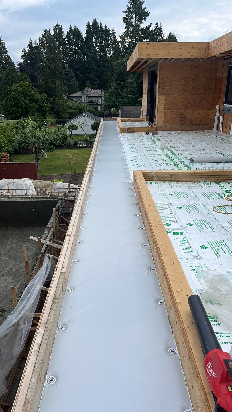 Residential Roofing Installation using Durolast roofing membrane by Top Notch Roofing Inc