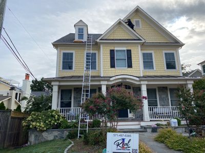 Residential Roofing Installation using Shingles 