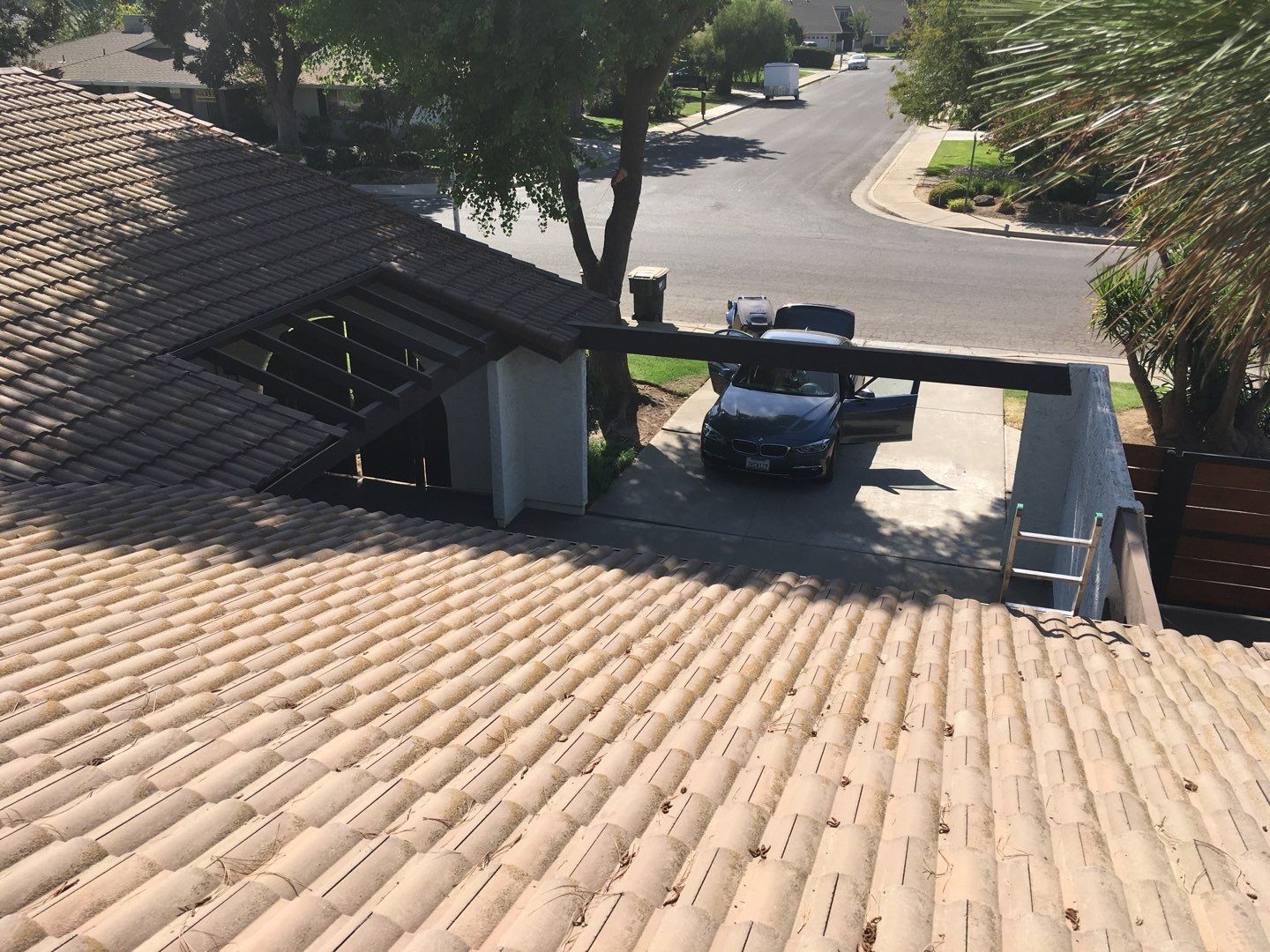 Tile roof remodel/ install OSB sheathing under tile and replace using OSB board with new underlayment, tile, and battens by Straight Edge Roofing Inc