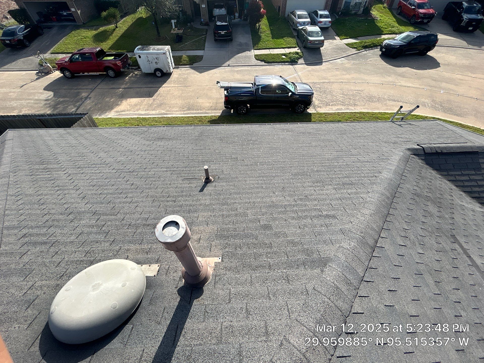 Reroof and Gutter Project in Houston by Roofing Technologies Unlimited